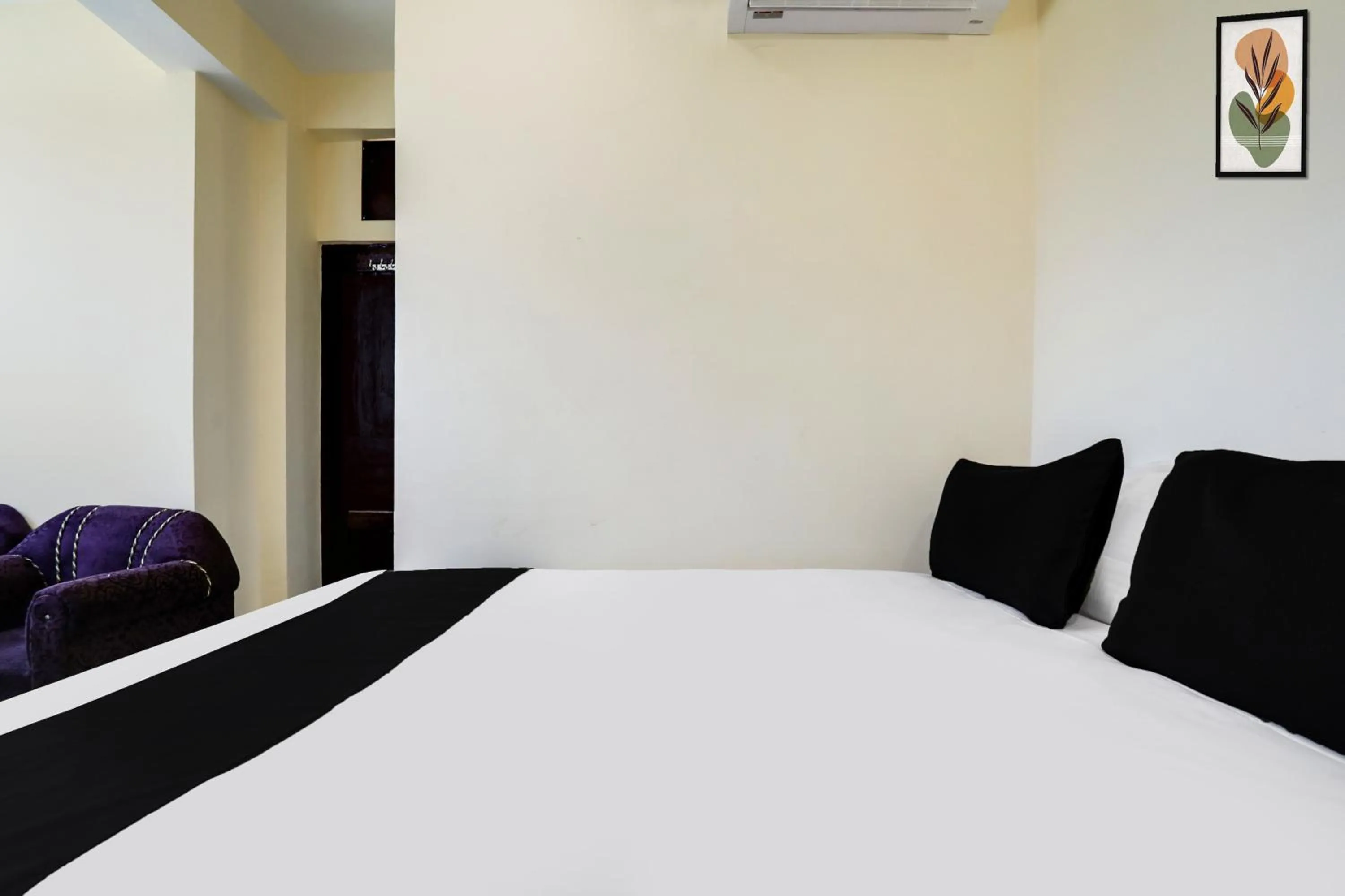 Bedroom in Hotel O M.V PALACE