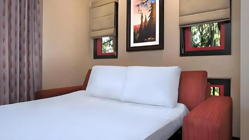 Bed in Disney's Wilderness Lodge
