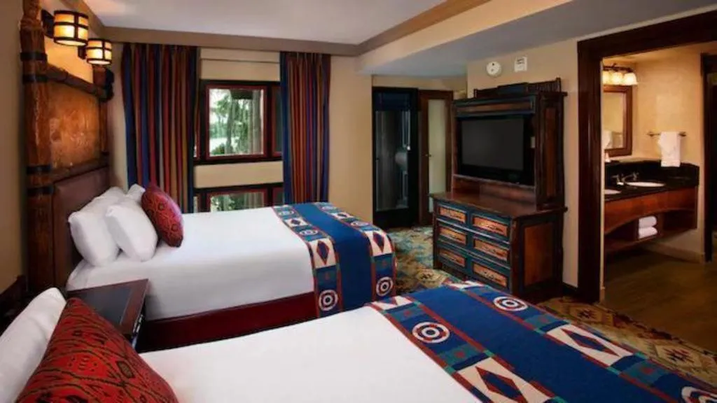 Bed in Disney's Wilderness Lodge