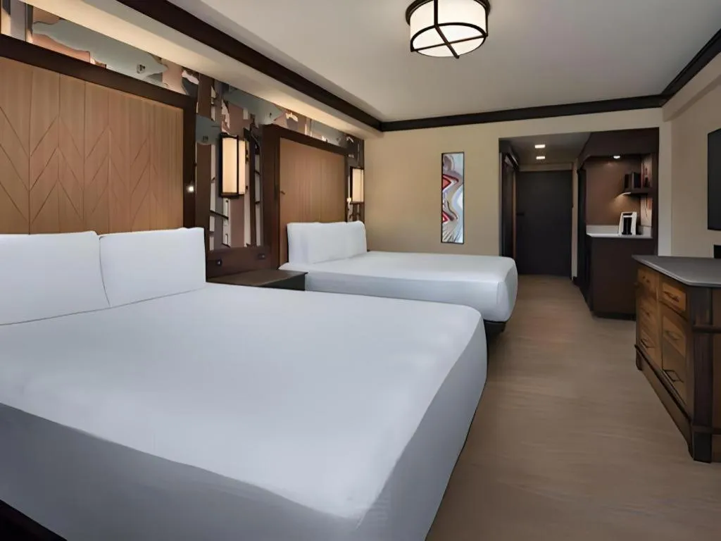 Bed in Disney's Wilderness Lodge