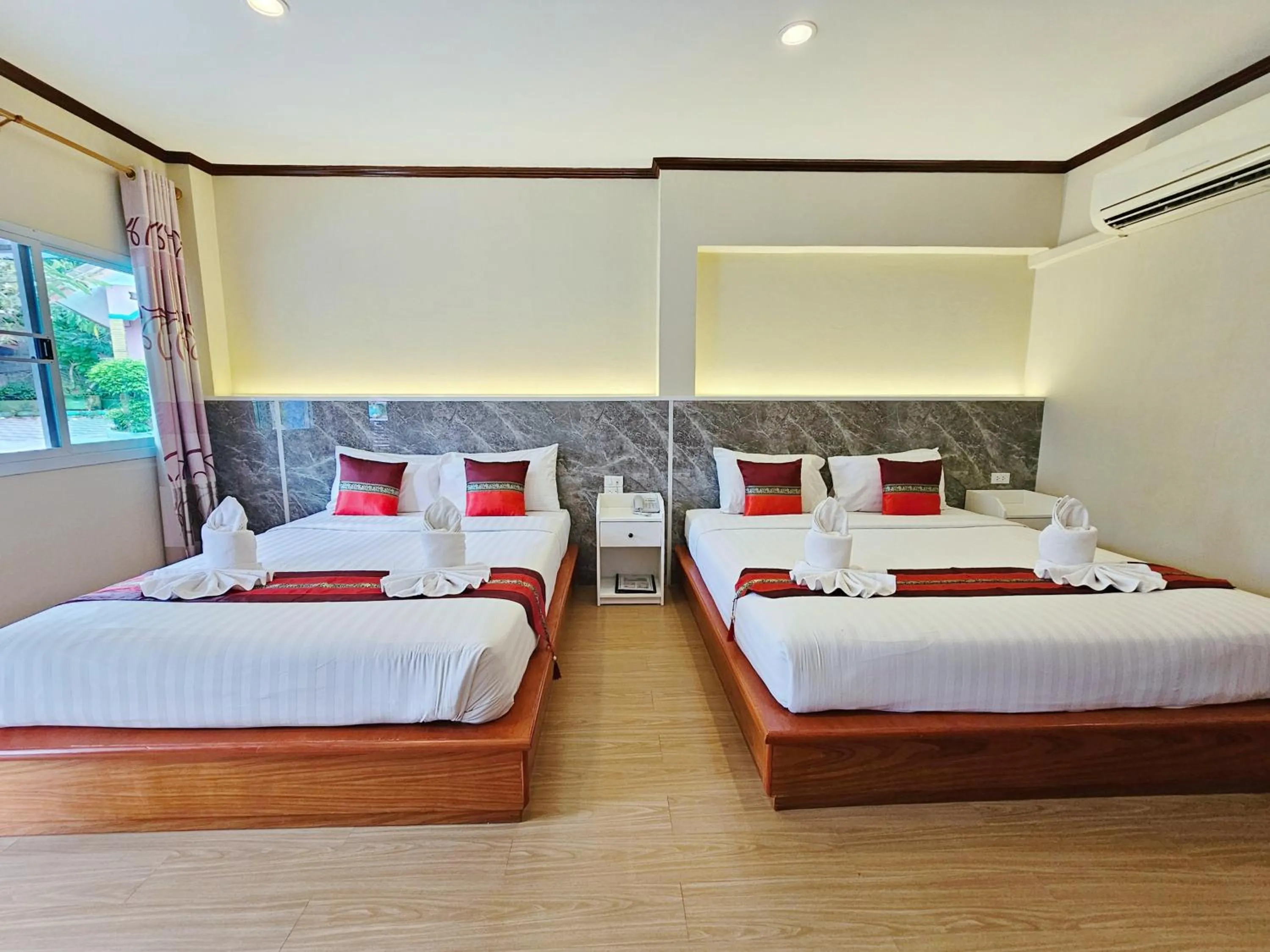 Bed in Phaithong Sotel Resort