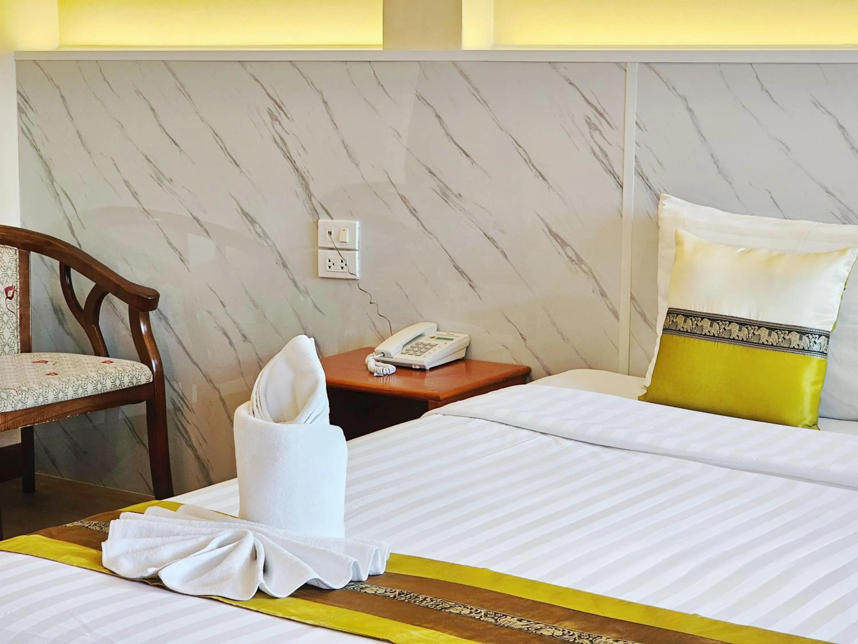 Bed in Phaithong Sotel Resort