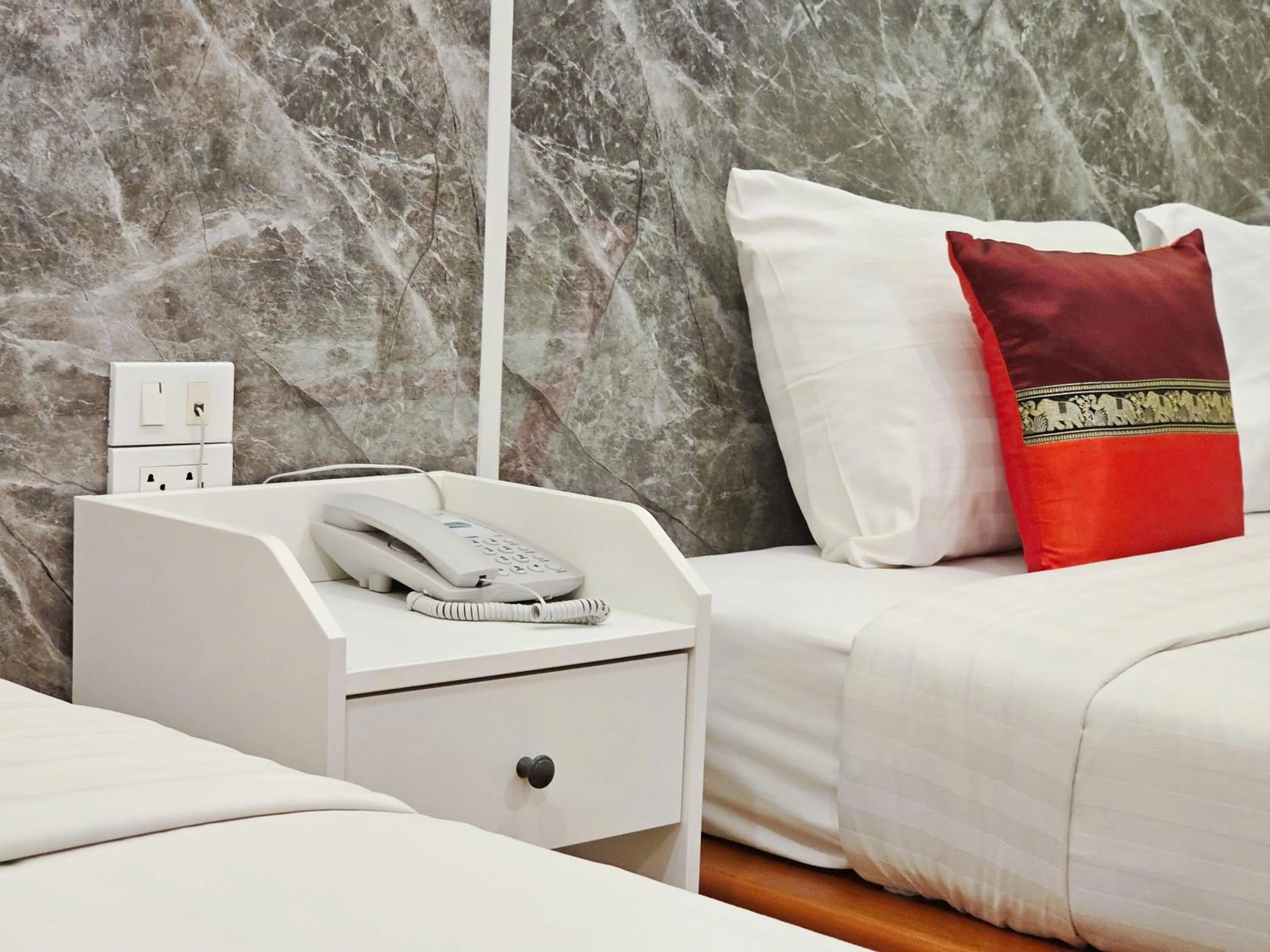 Bed in Phaithong Sotel Resort