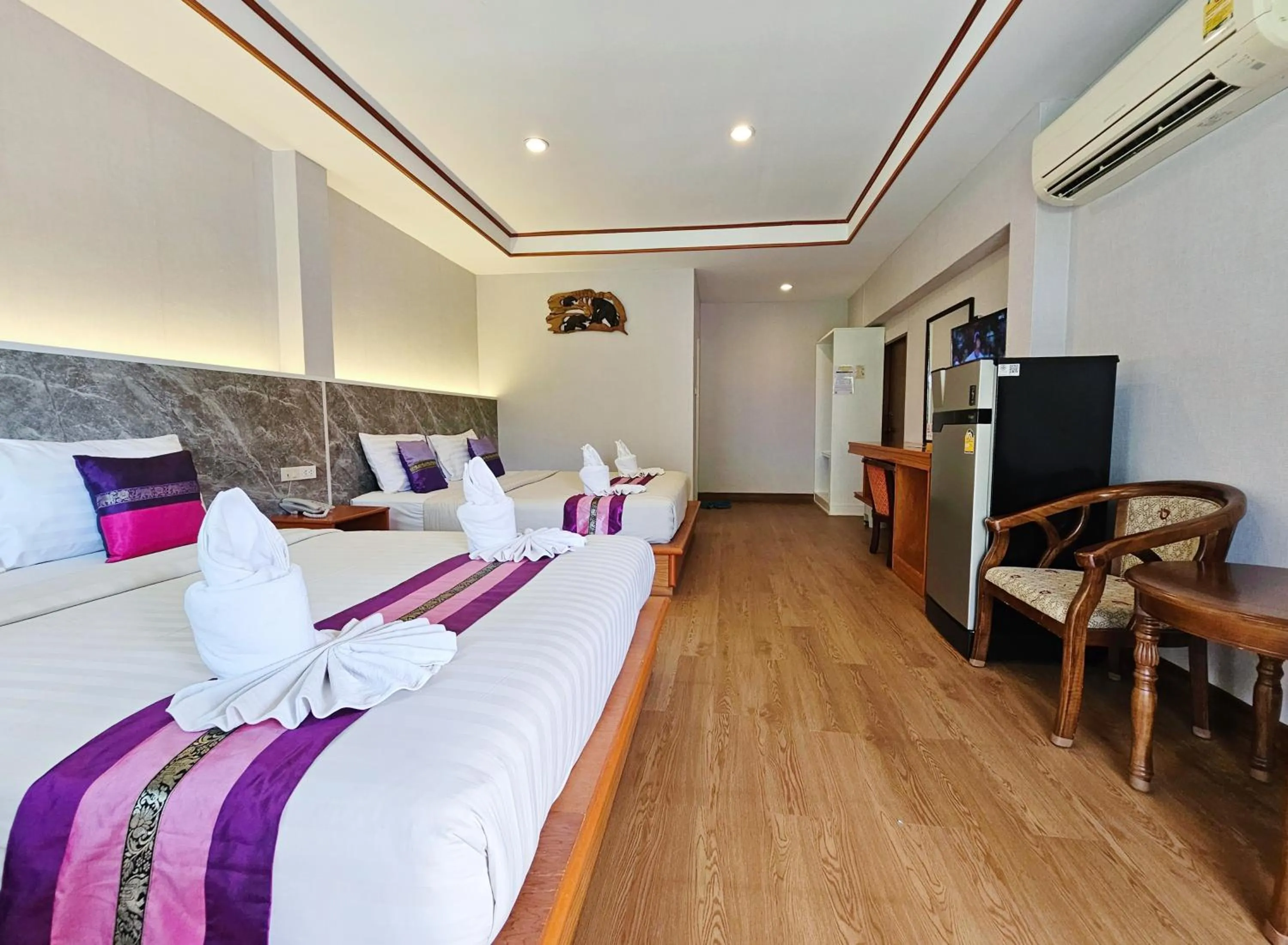 Bed in Phaithong Sotel Resort