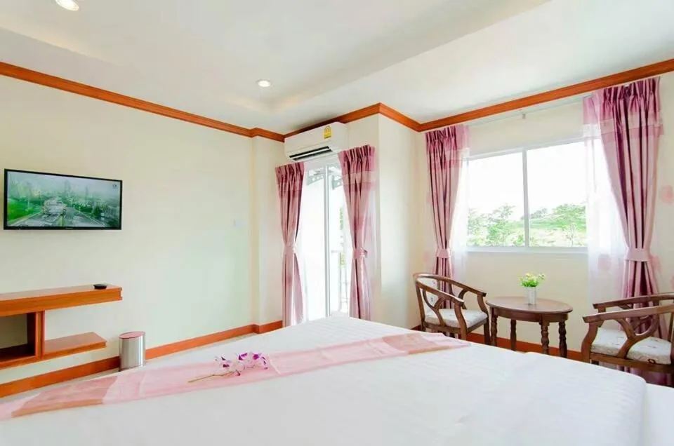 Bed in Phaithong Sotel Resort