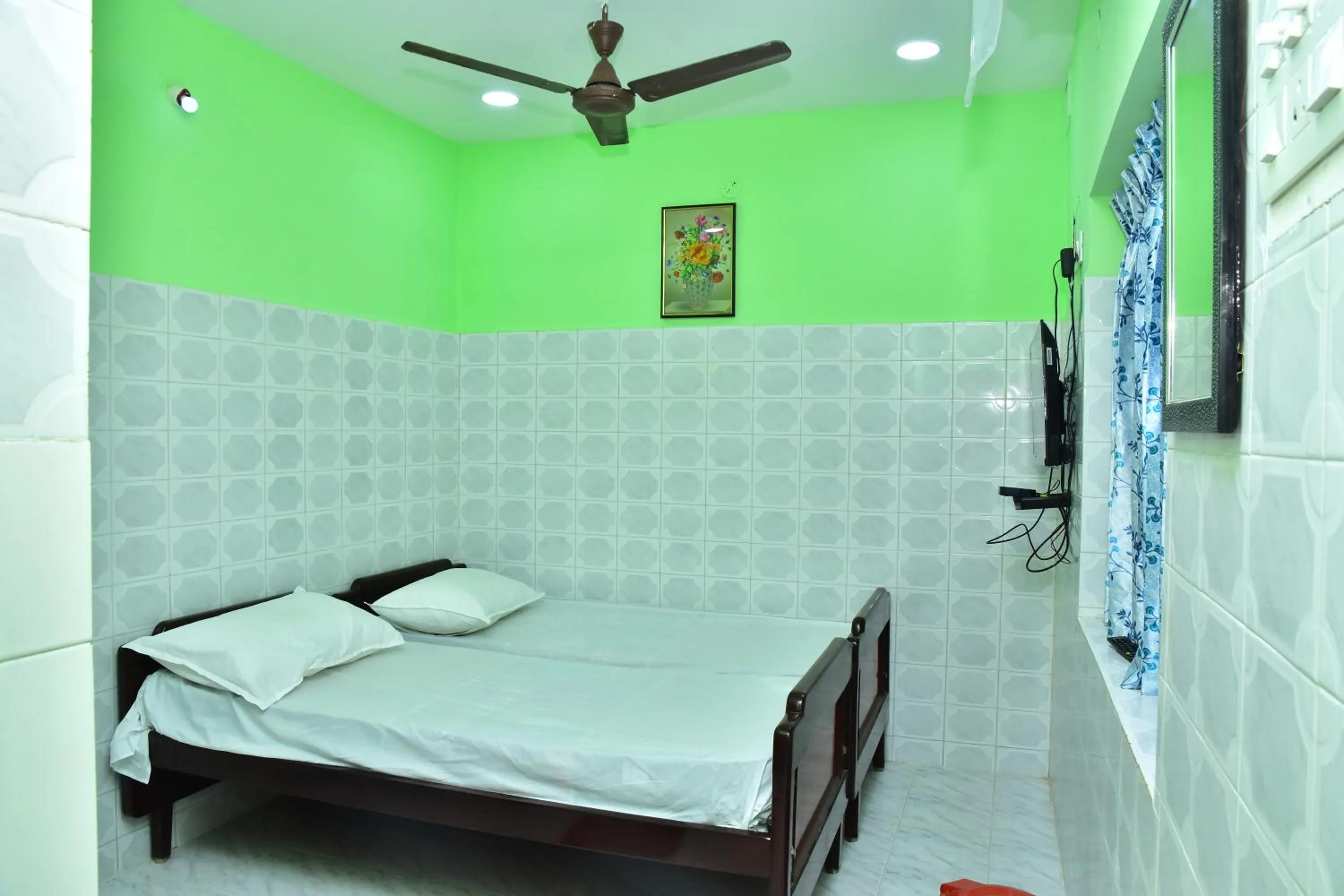 Bed in Sri Tirumalaa Hotel