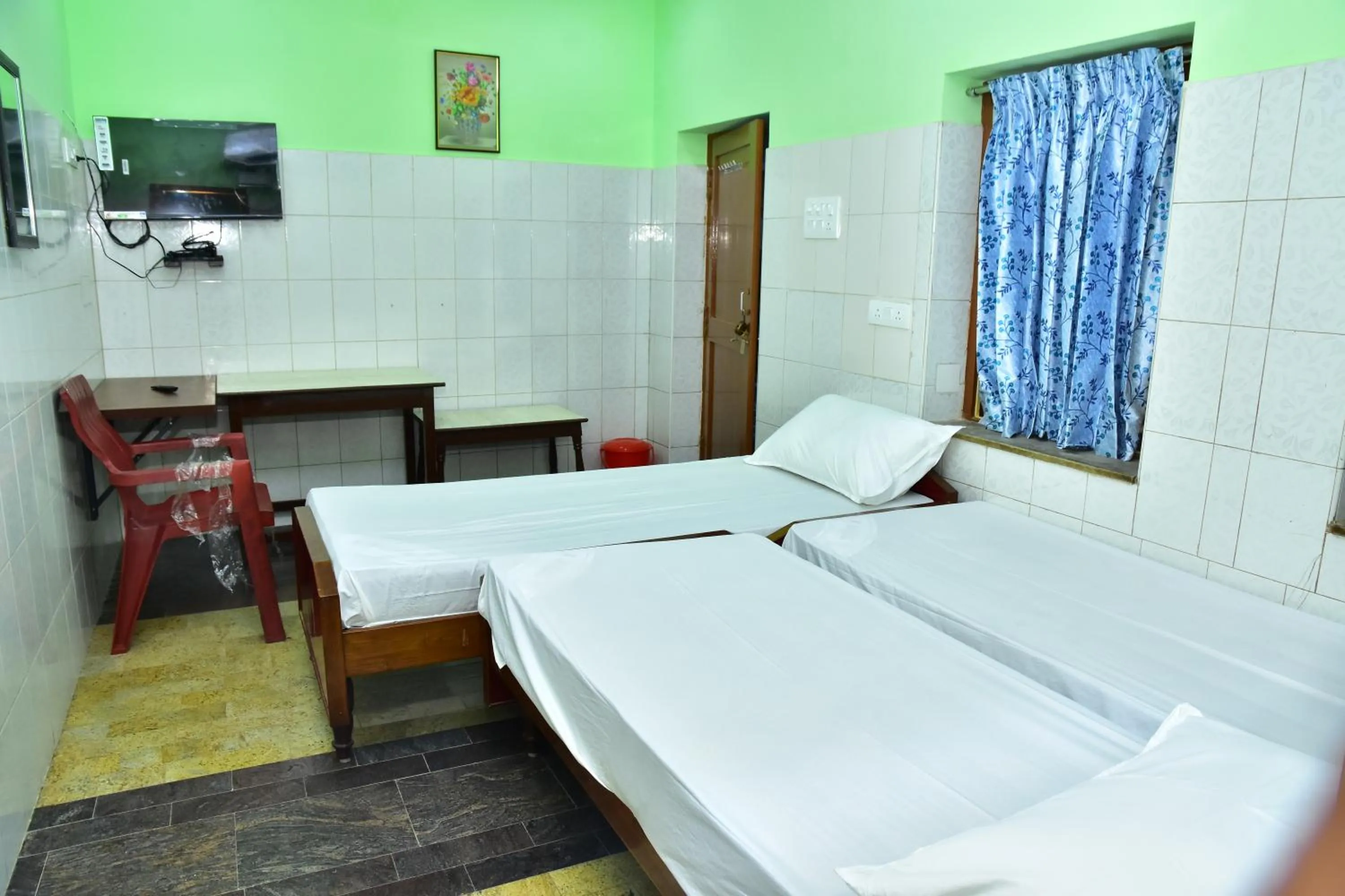 Bed in Sri Tirumalaa Hotel
