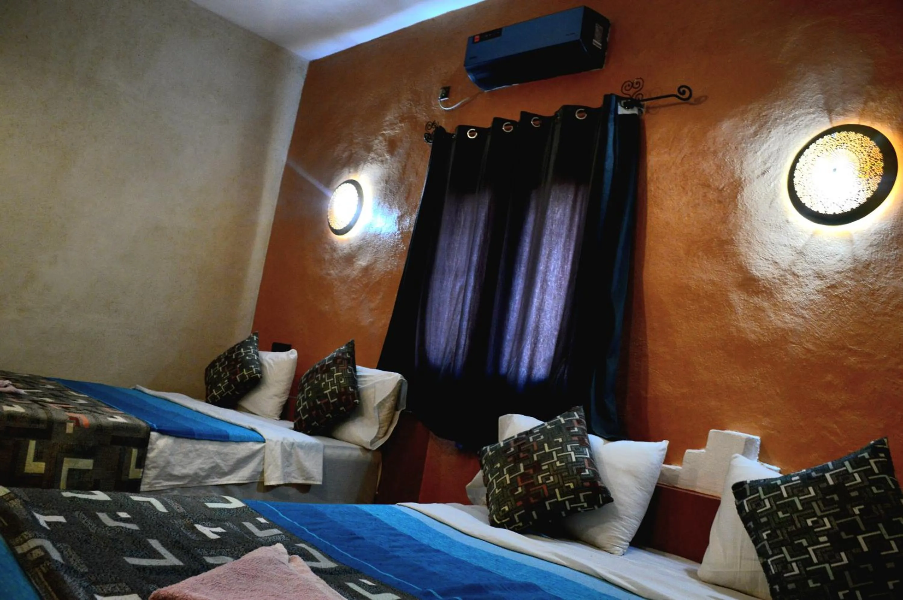 Bed in Kasbah Du Berger & Piscine