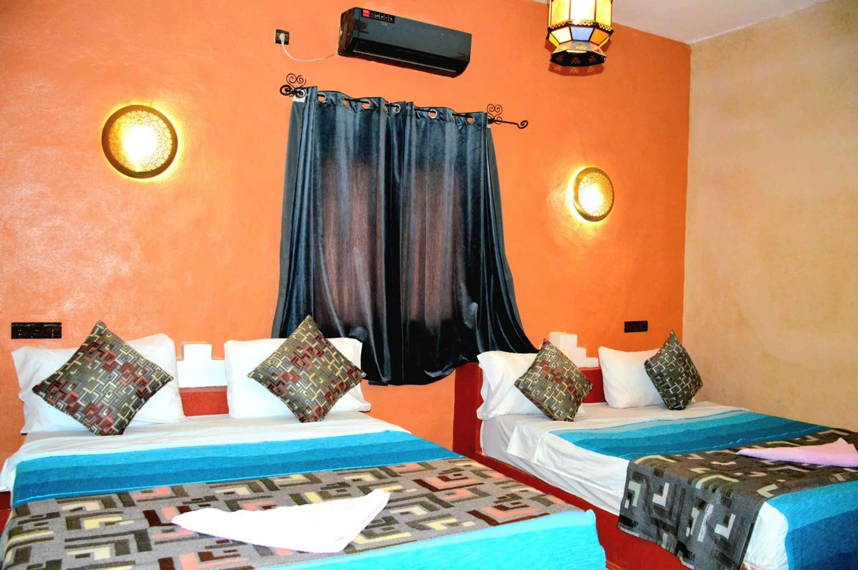 Bed in Kasbah Du Berger & Piscine