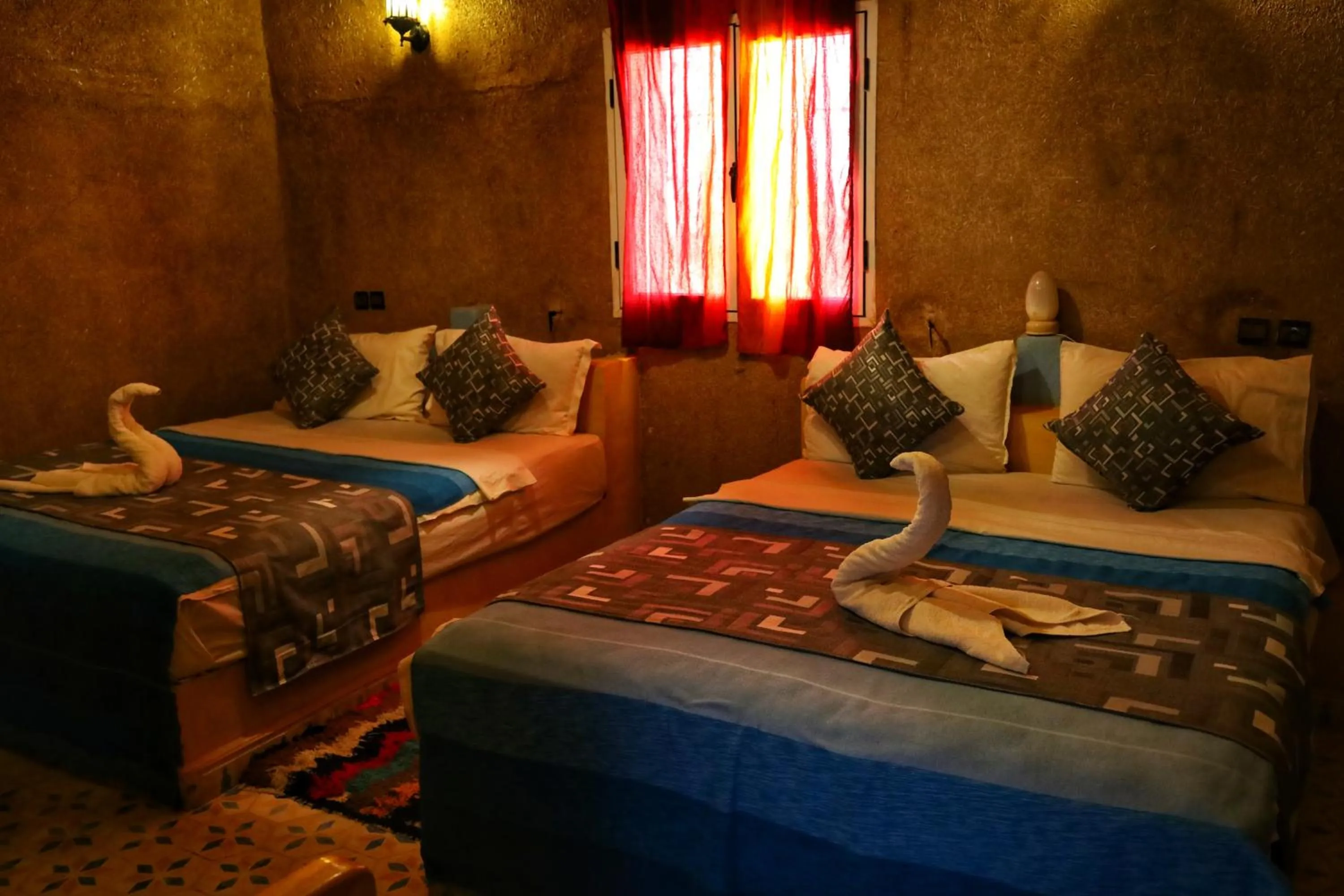 Bed in Kasbah Du Berger & Piscine