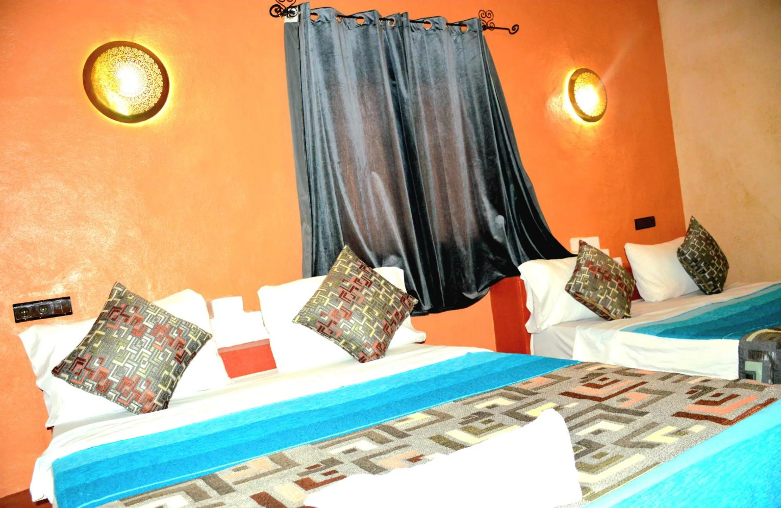 Bed in Kasbah Du Berger & Piscine