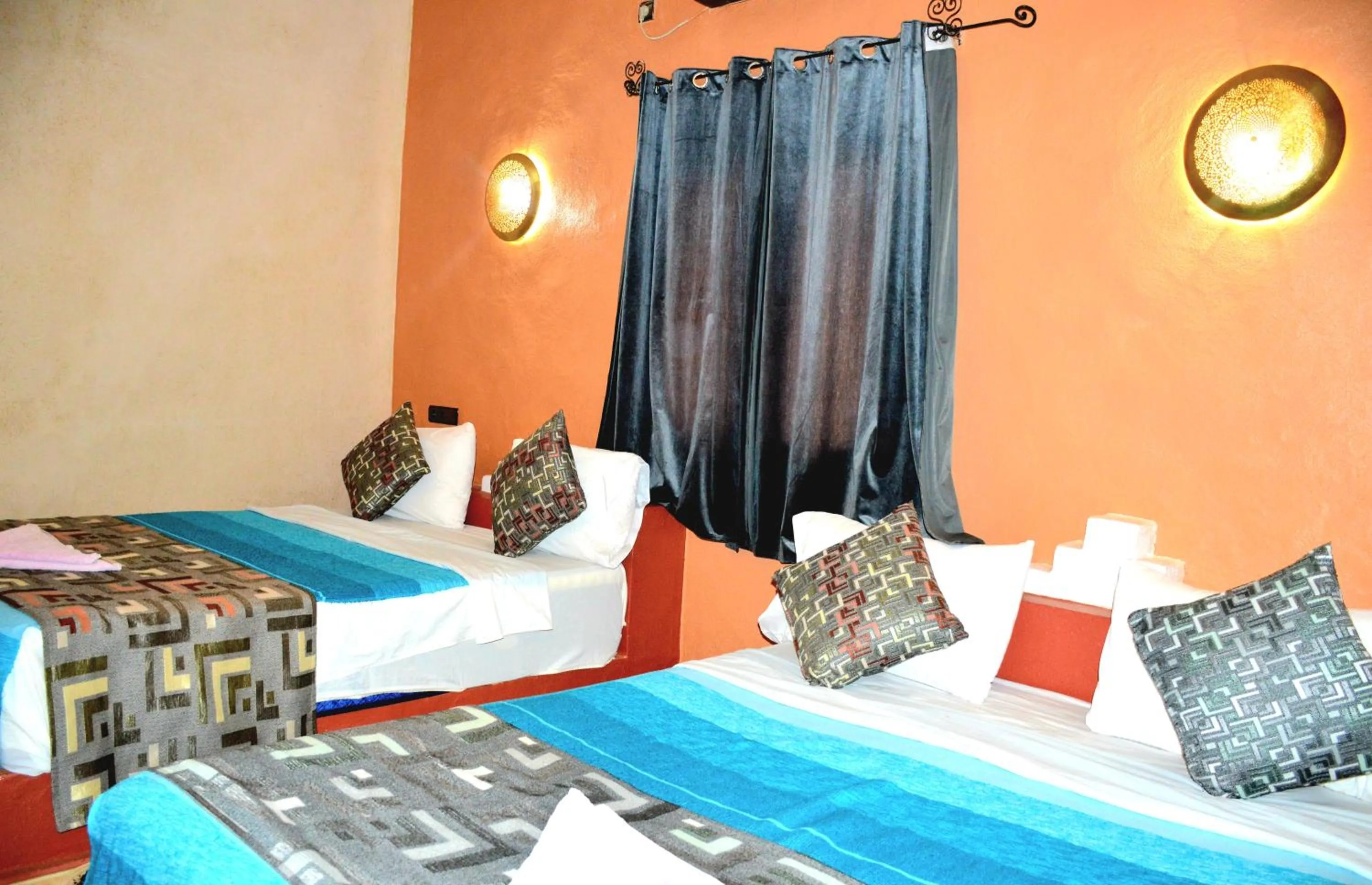 Bed in Kasbah Du Berger & Piscine