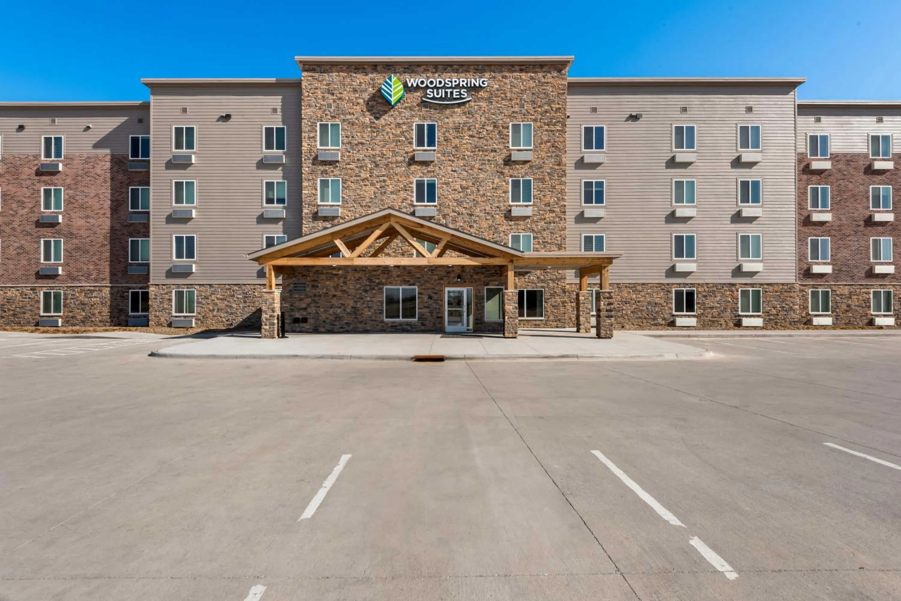 Property building in WoodSpring Suites Coralville Iowa City