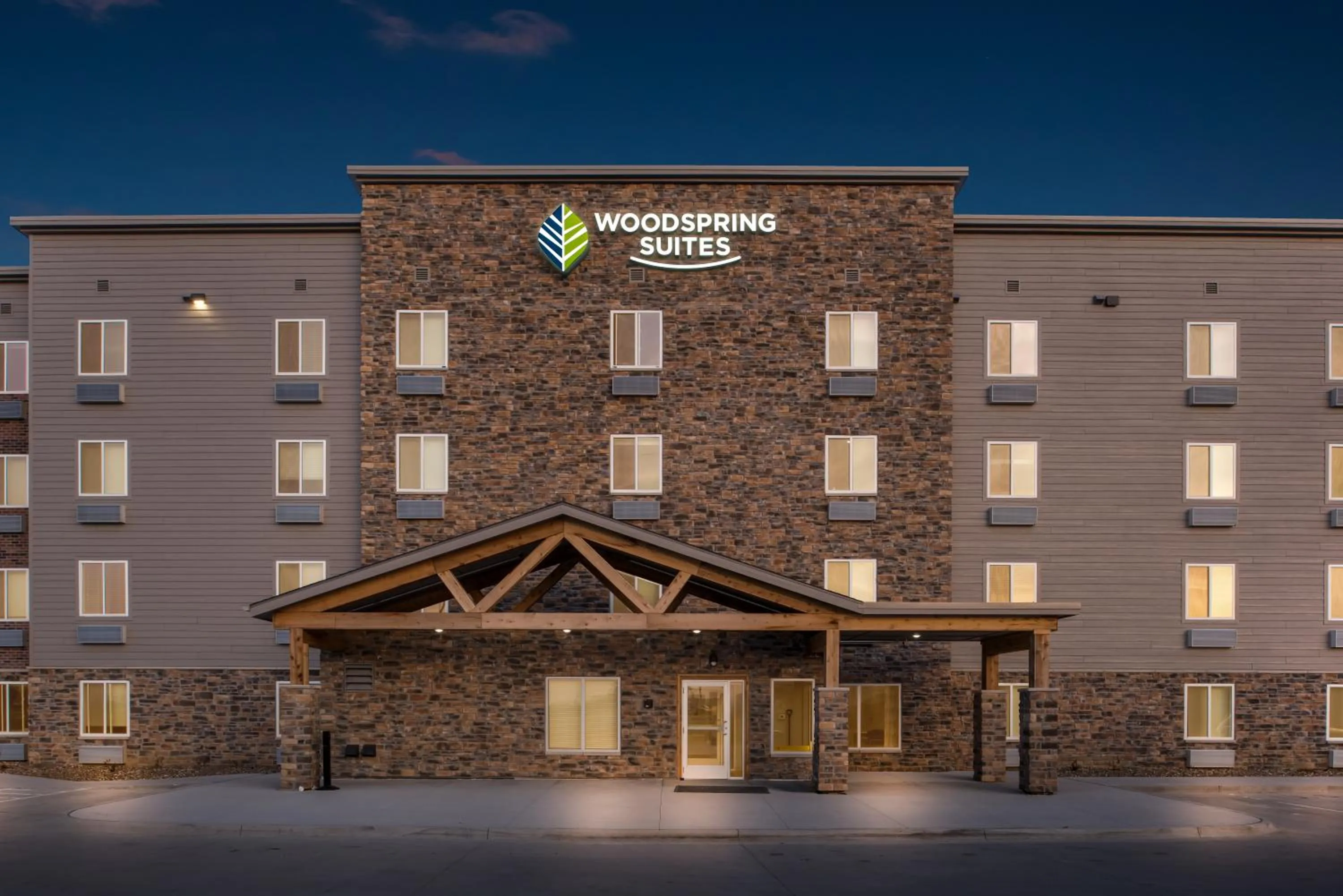 Property building in WoodSpring Suites Coralville Iowa City