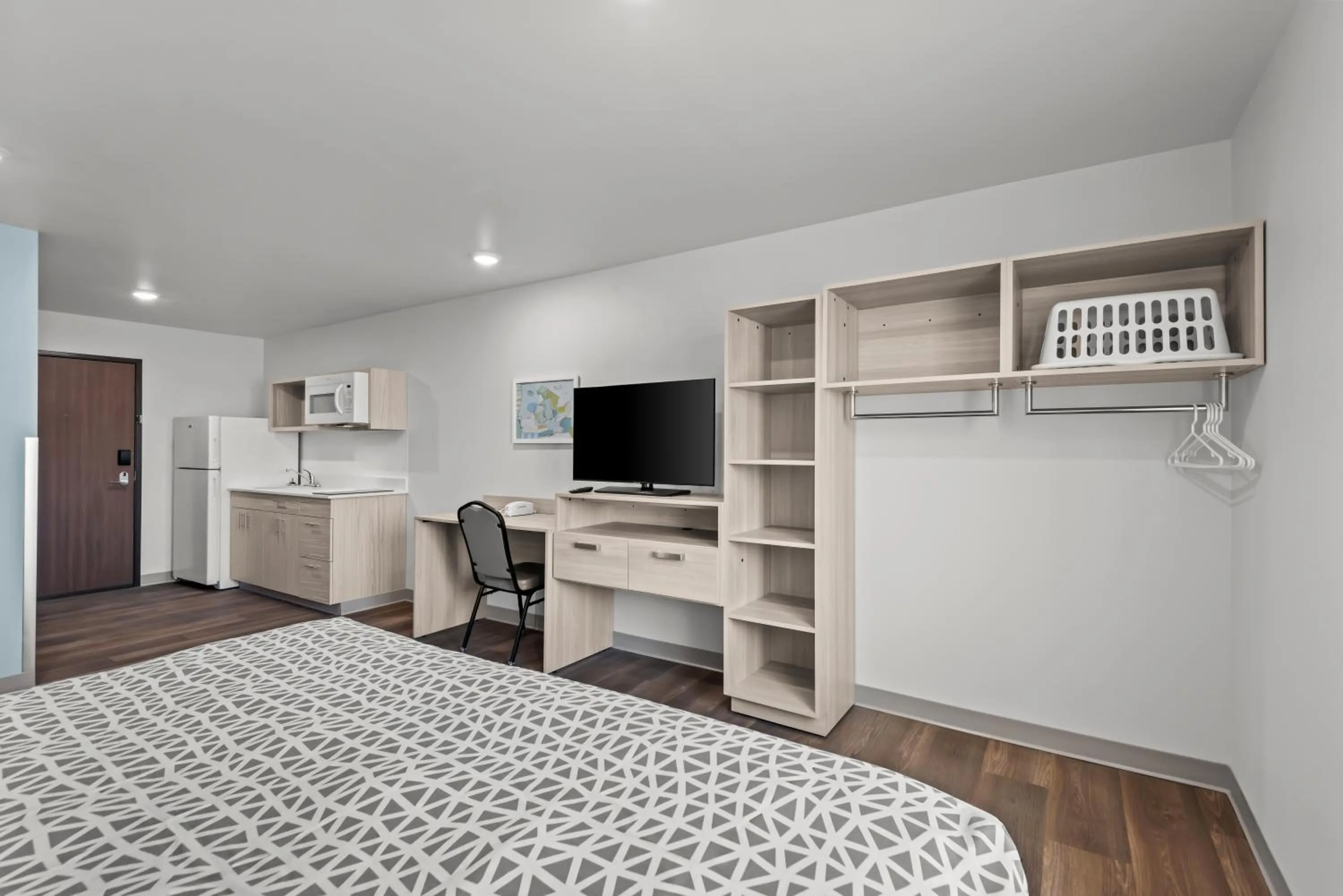 Bedroom, Bed in WoodSpring Suites Coralville Iowa City