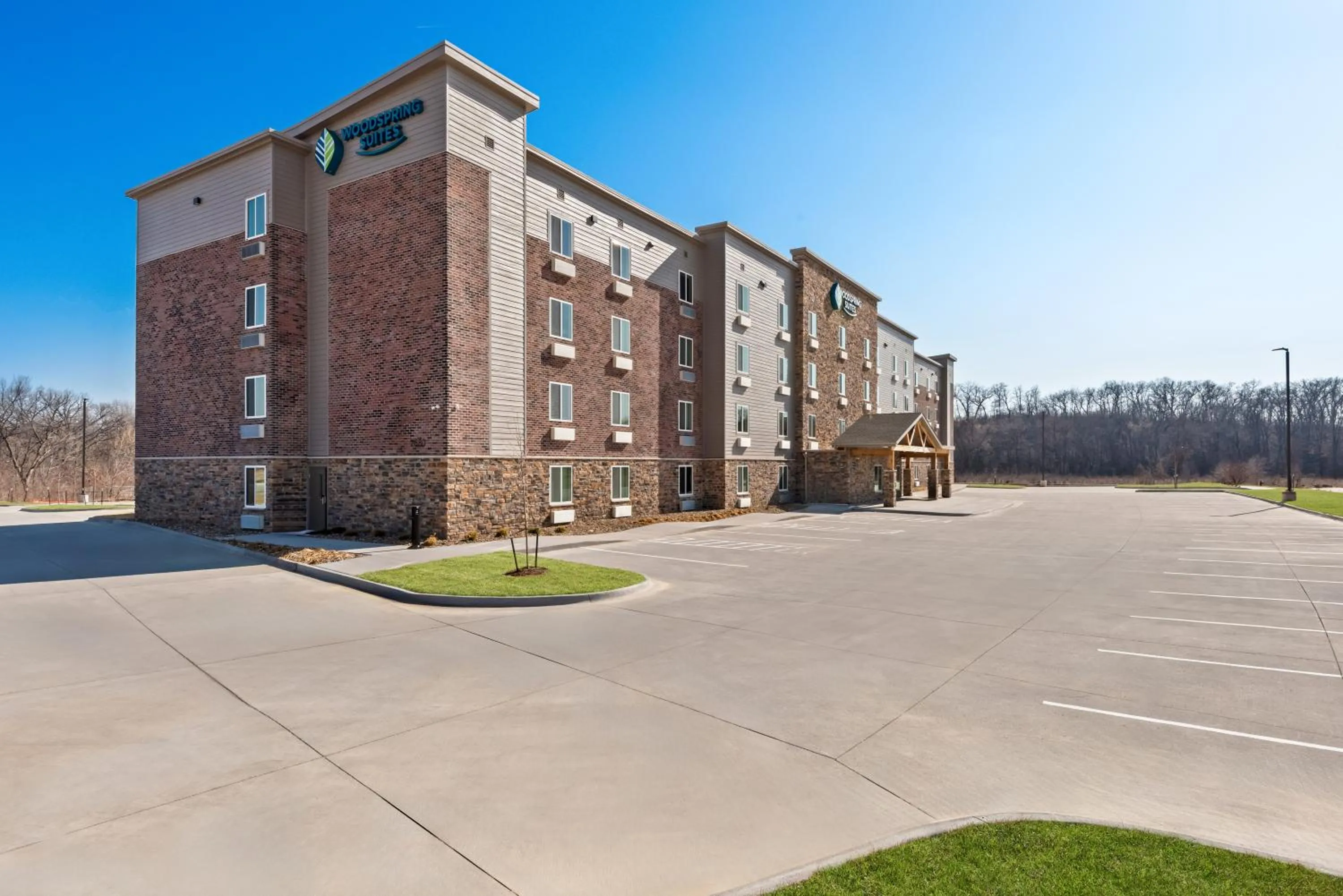 Property building in WoodSpring Suites Coralville Iowa City