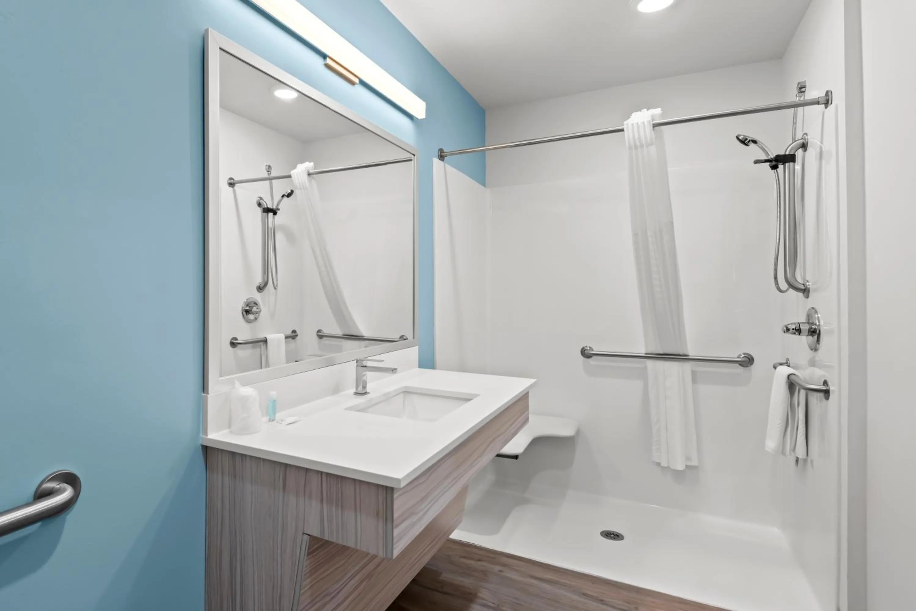 Bathroom in WoodSpring Suites Coralville Iowa City