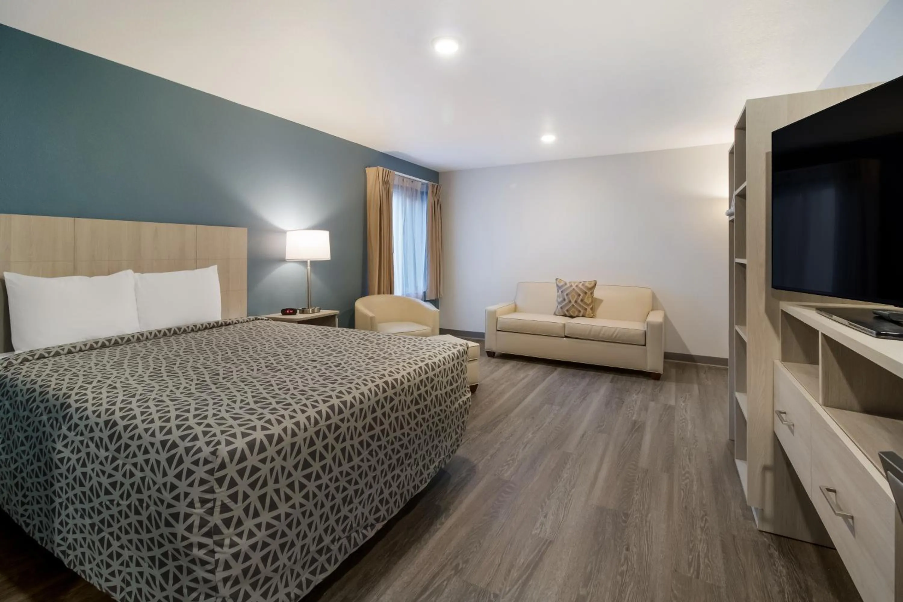 QUEEN SUITE WITH SOFA in WoodSpring Suites Charlotte Airport