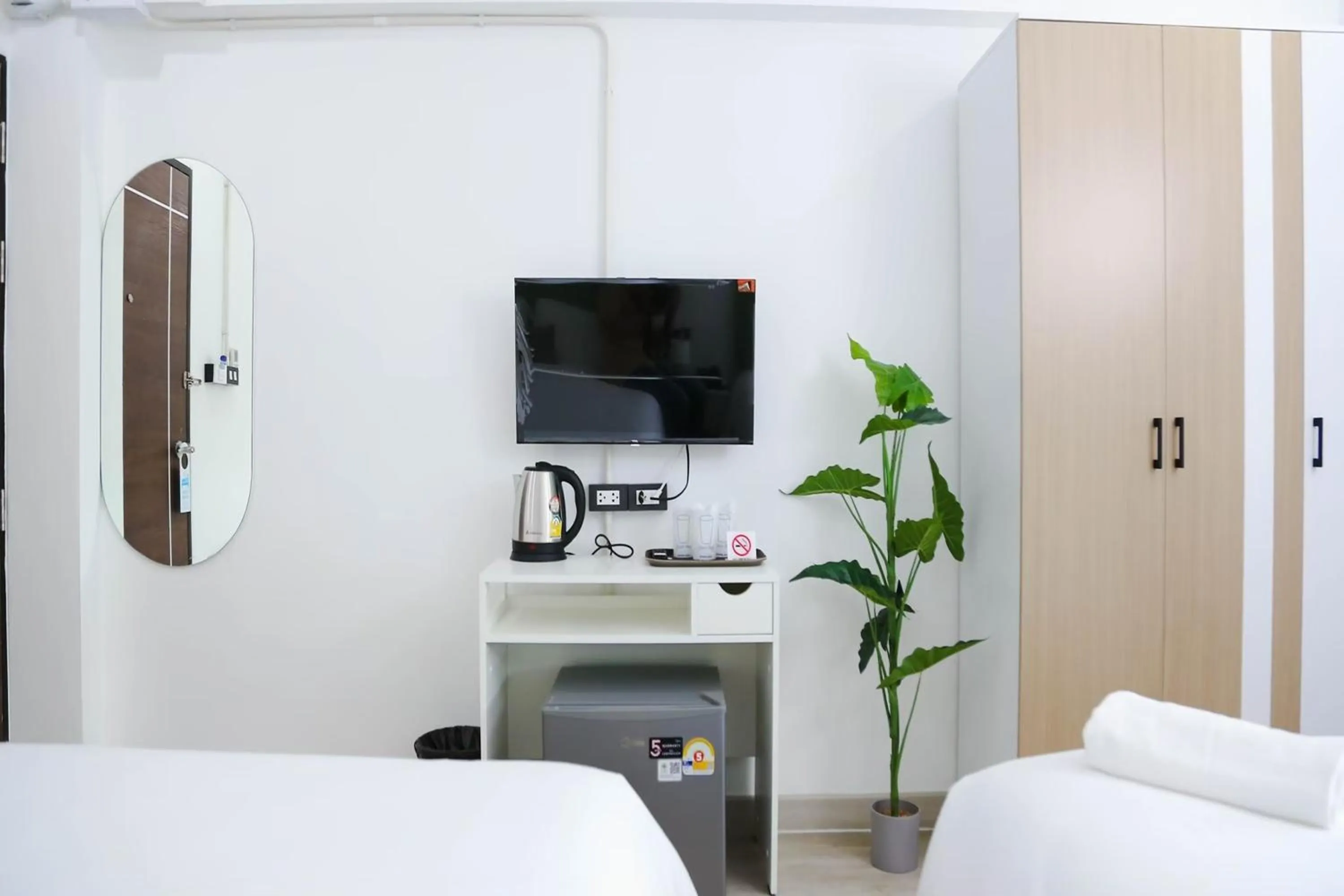 Bed in Chana Bangkok Hotel