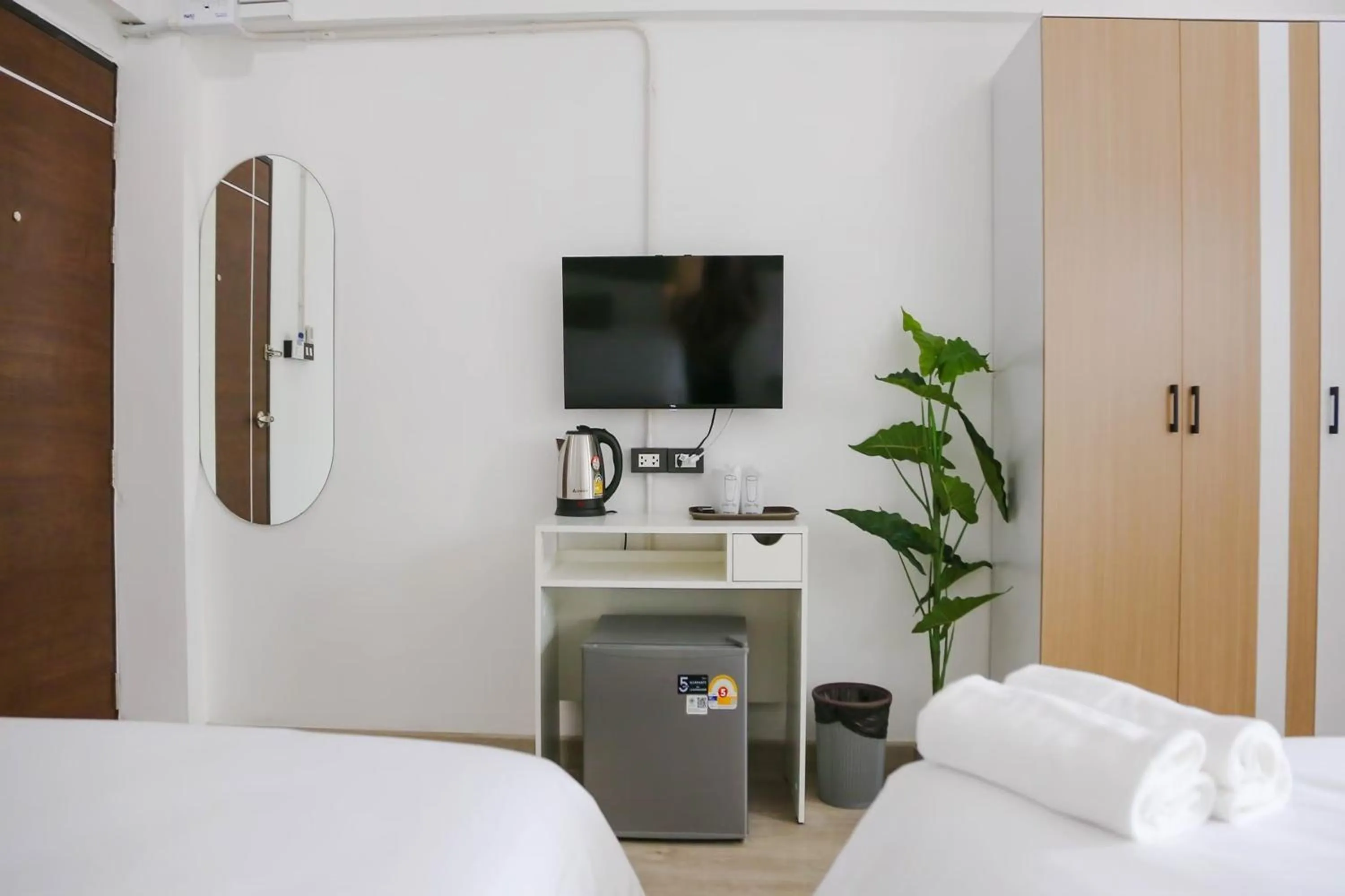 Bed in Chana Bangkok Hotel