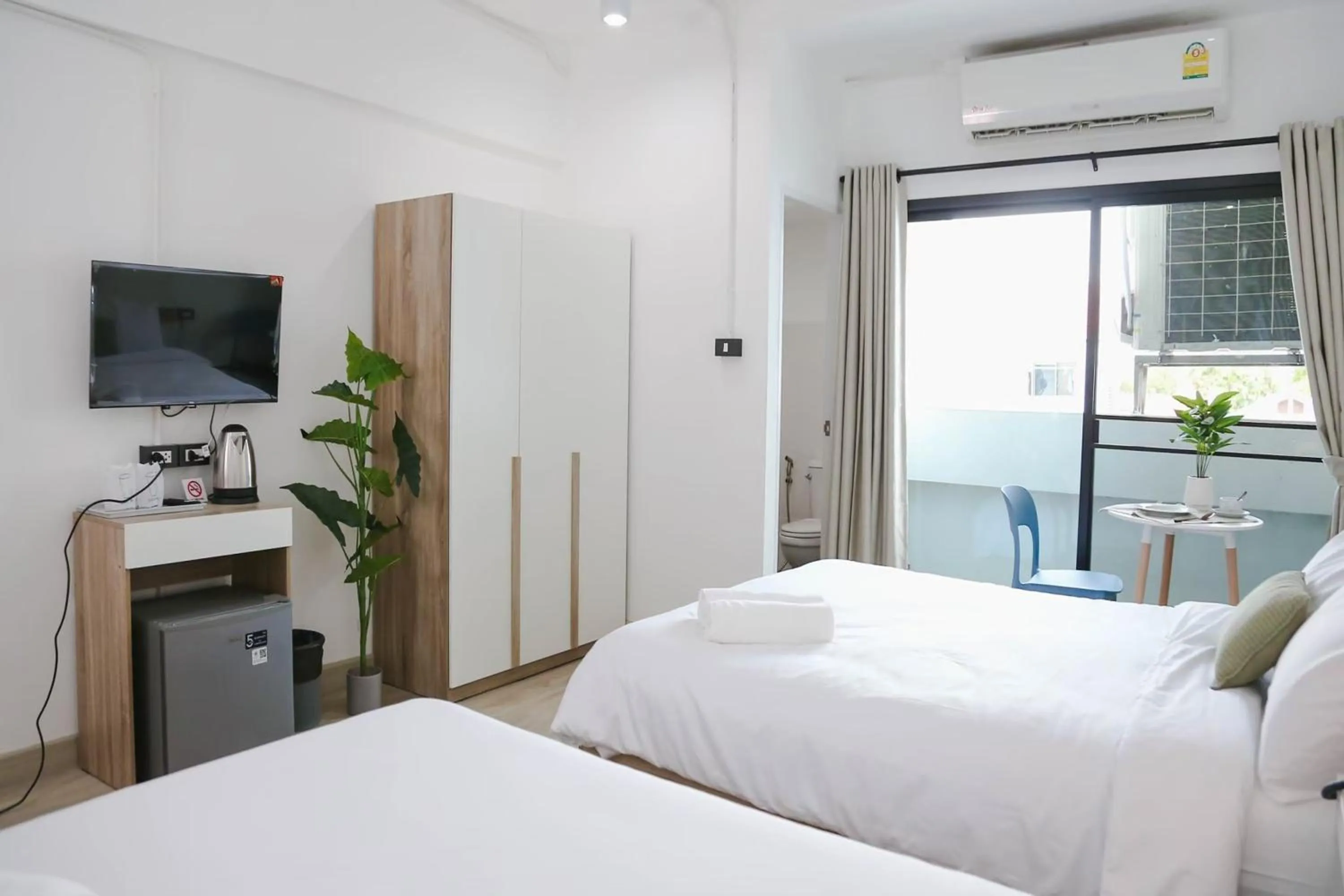 Bed in Chana Bangkok Hotel