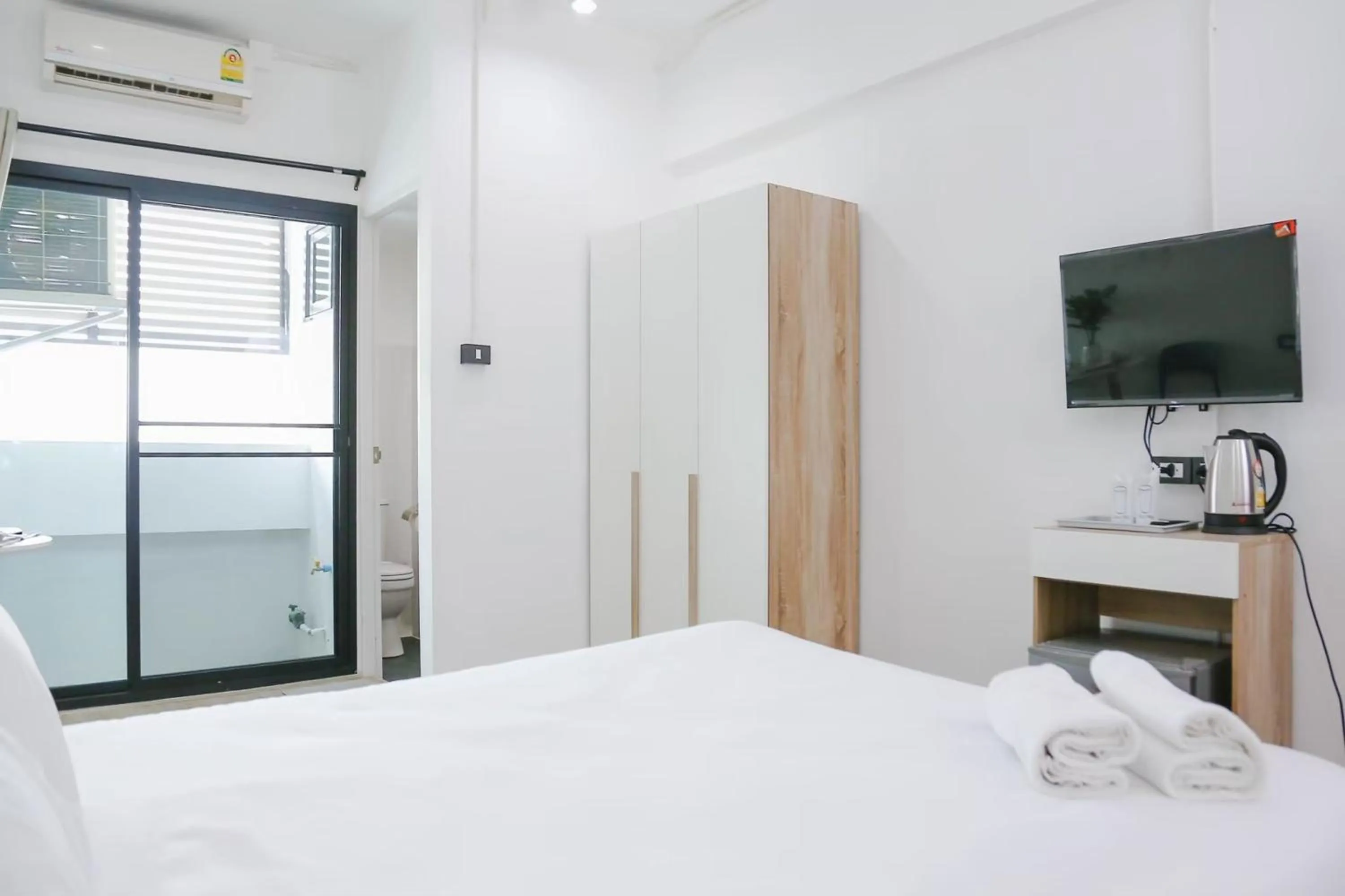 Bed in Chana Bangkok Hotel