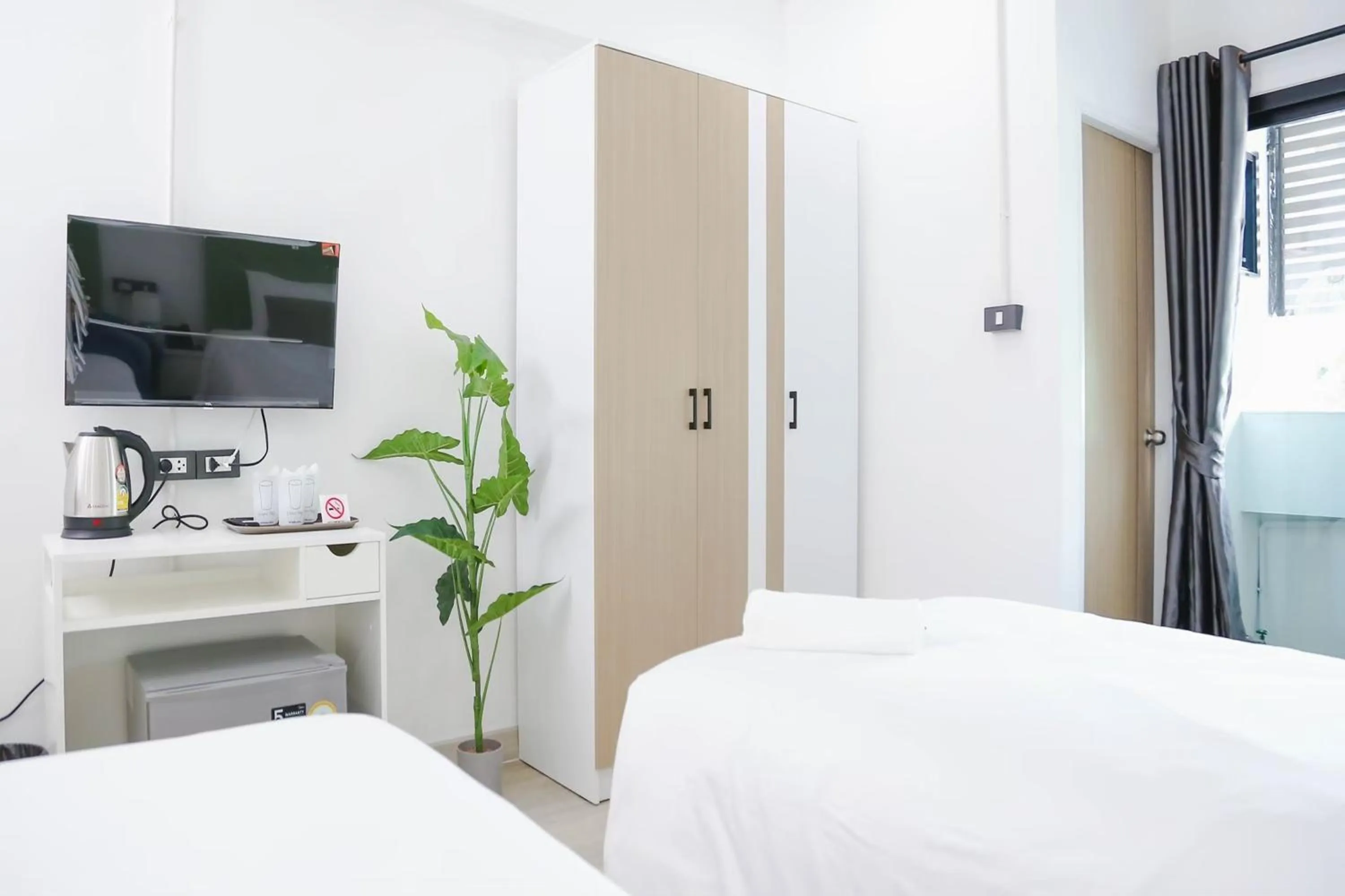 Bed in Chana Bangkok Hotel