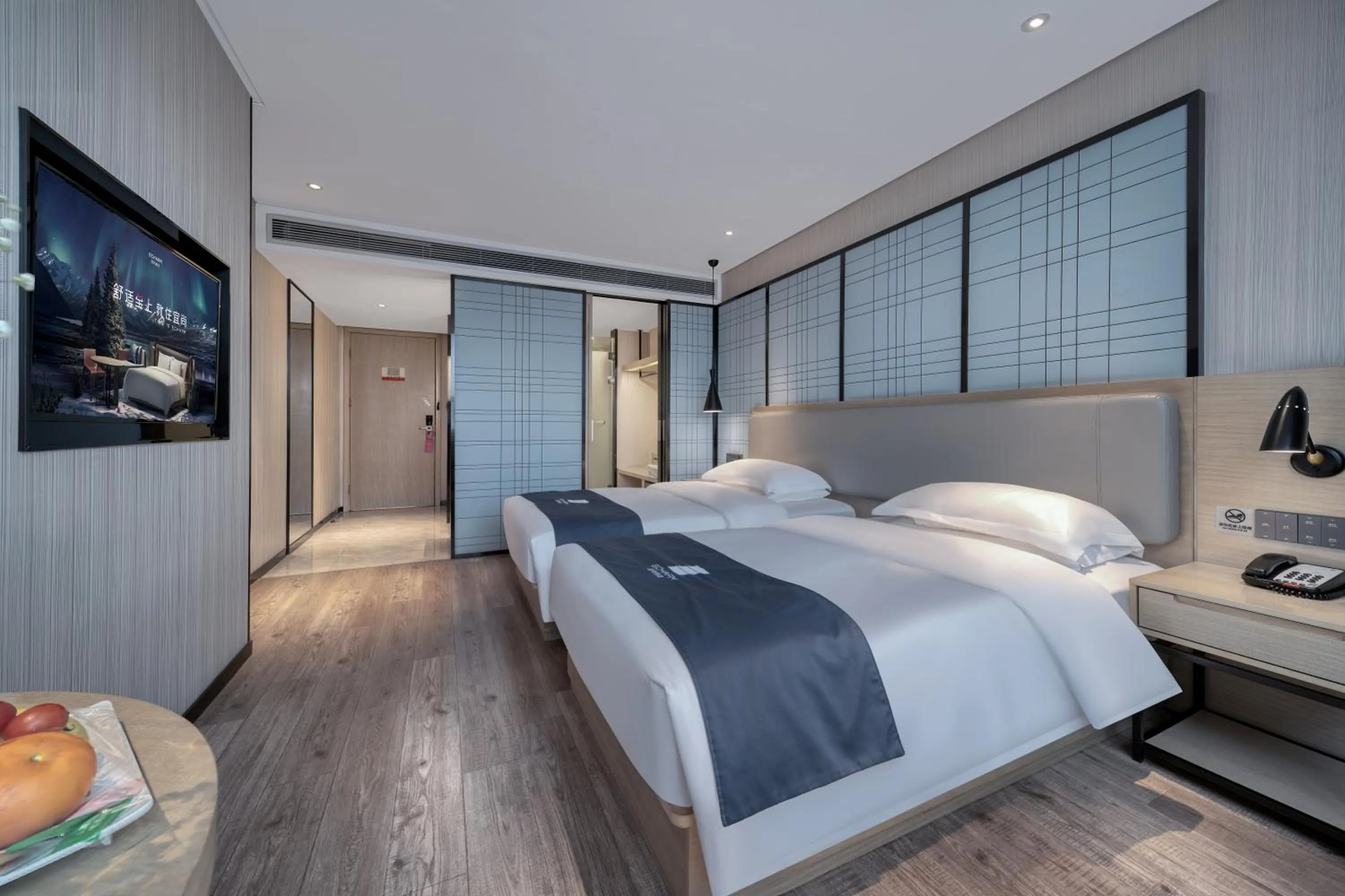 Bed in Echarm International Hotel Nanzhou Metro Station Branch