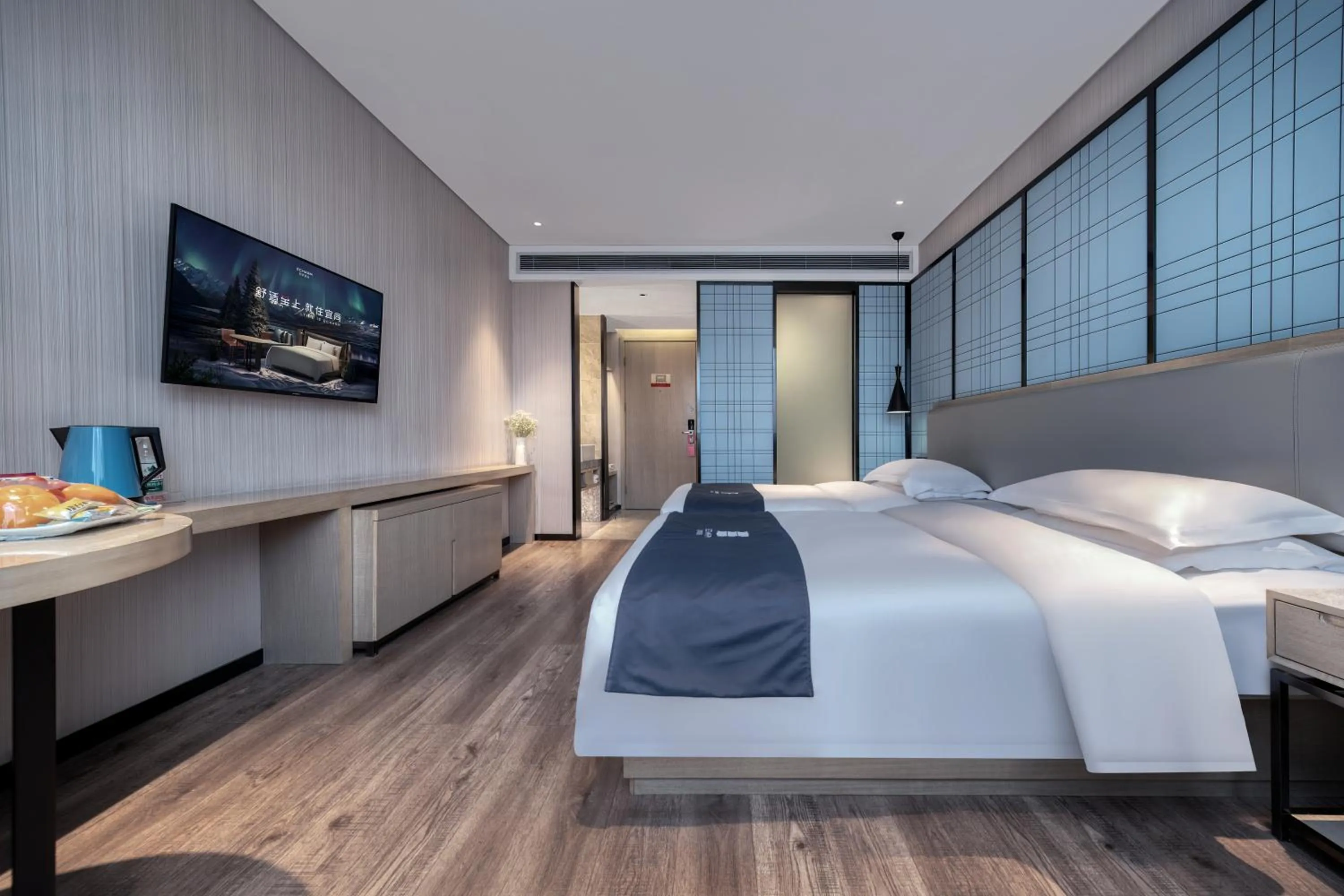 Bed in Echarm International Hotel Nanzhou Metro Station Branch
