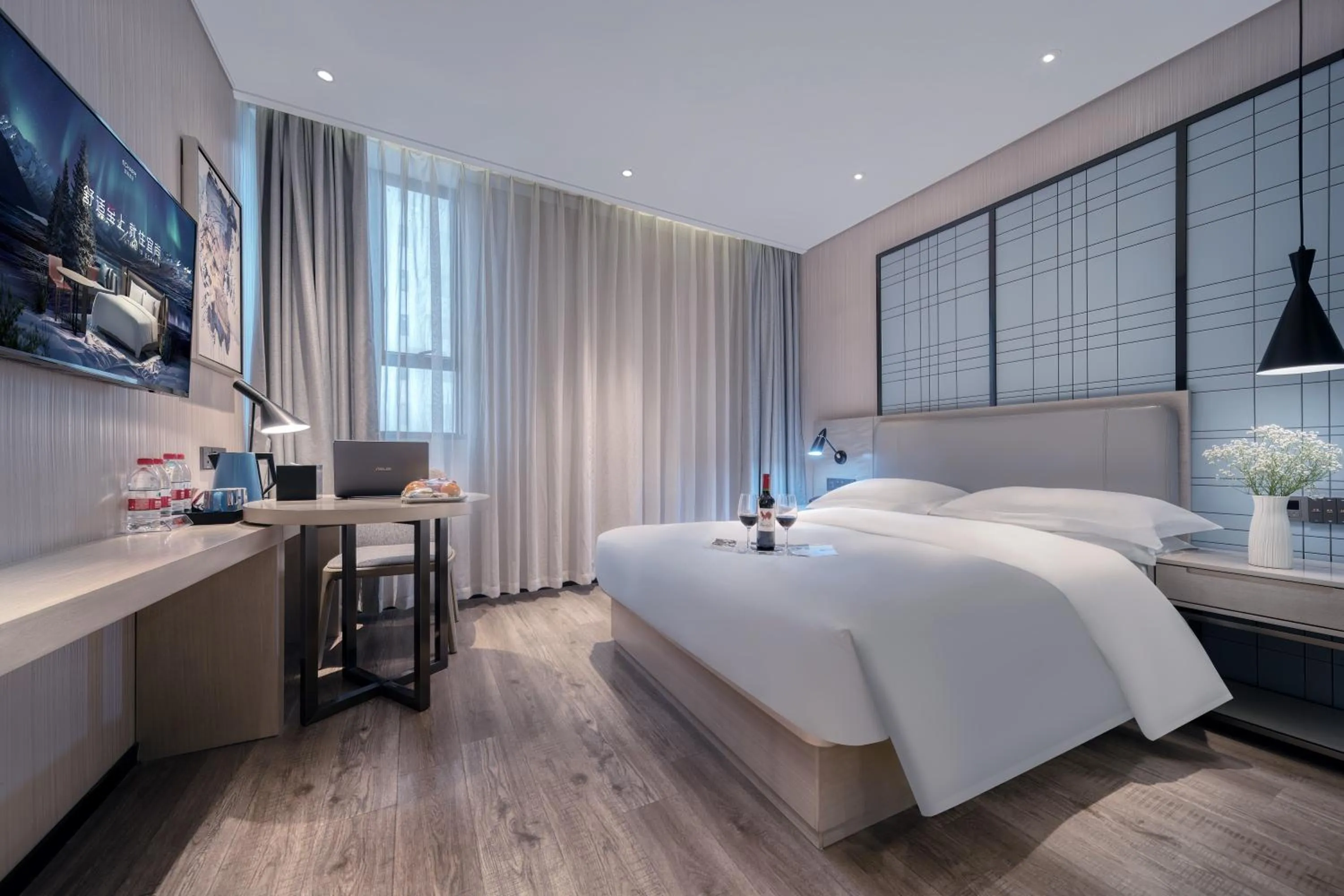 Bed in Echarm International Hotel Nanzhou Metro Station Branch