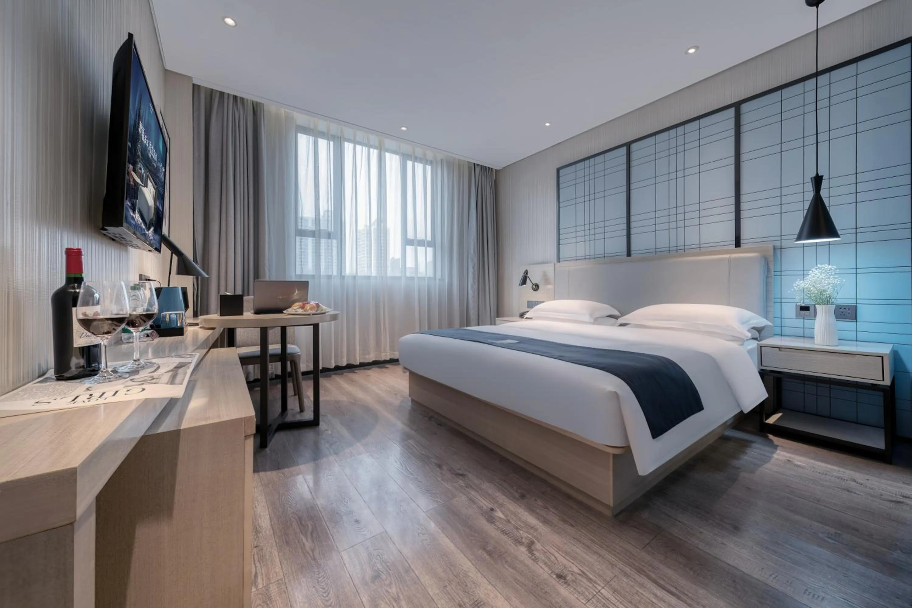 Bed in Echarm International Hotel Nanzhou Metro Station Branch