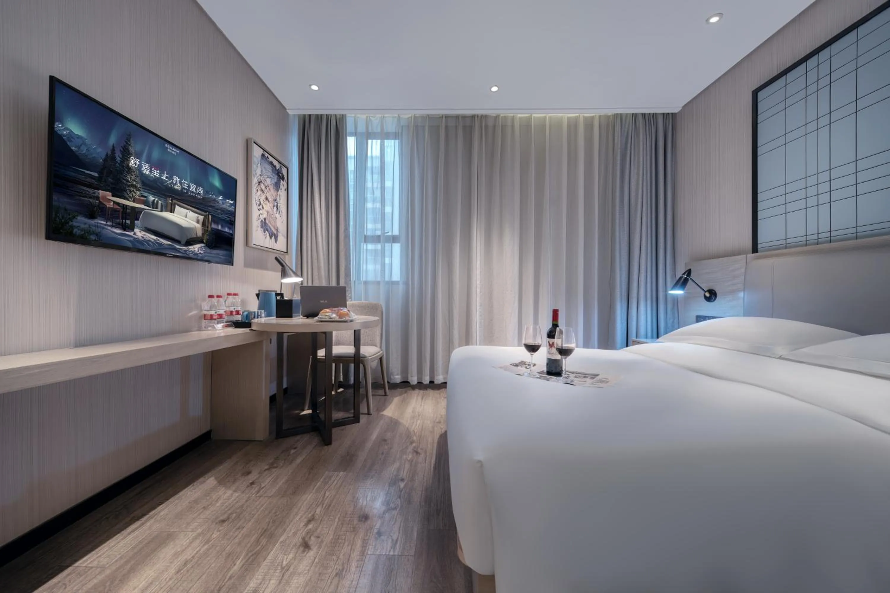 Bed in Echarm International Hotel Nanzhou Metro Station Branch