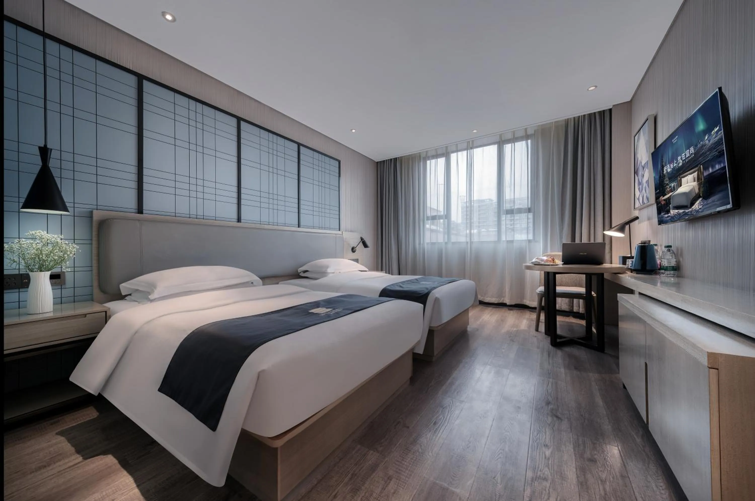Bed in Echarm International Hotel Nanzhou Metro Station Branch