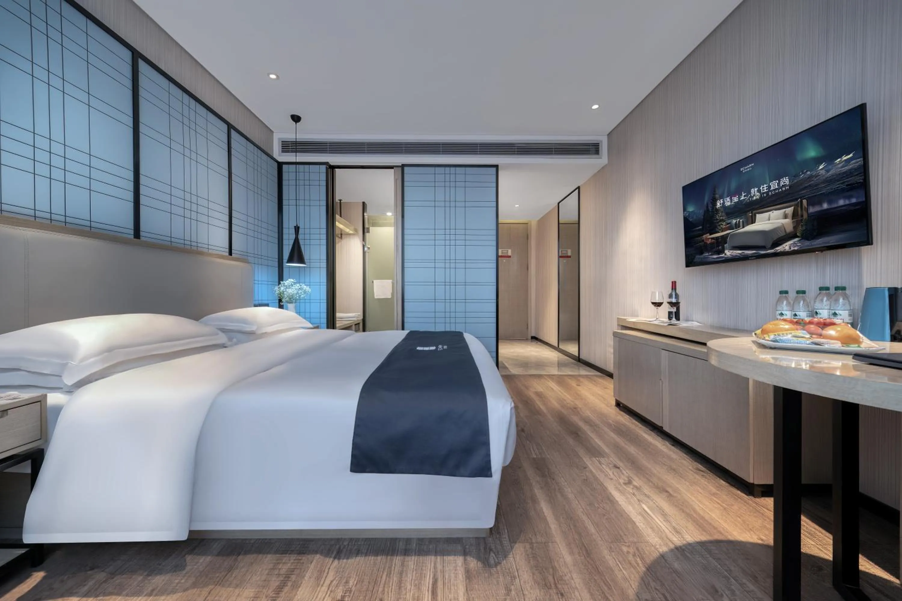 Bed in Echarm International Hotel Nanzhou Metro Station Branch
