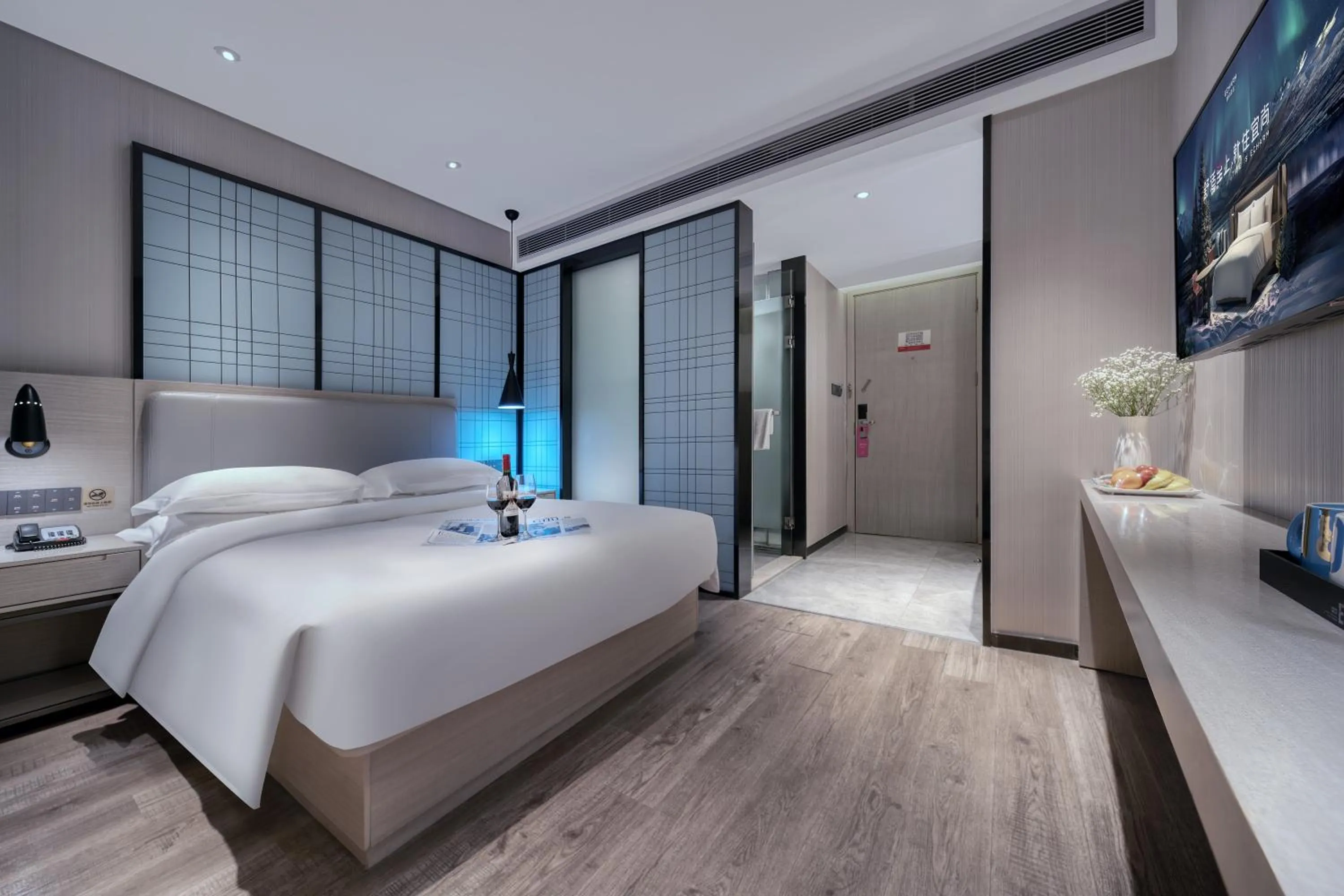 Bed in Echarm International Hotel Nanzhou Metro Station Branch