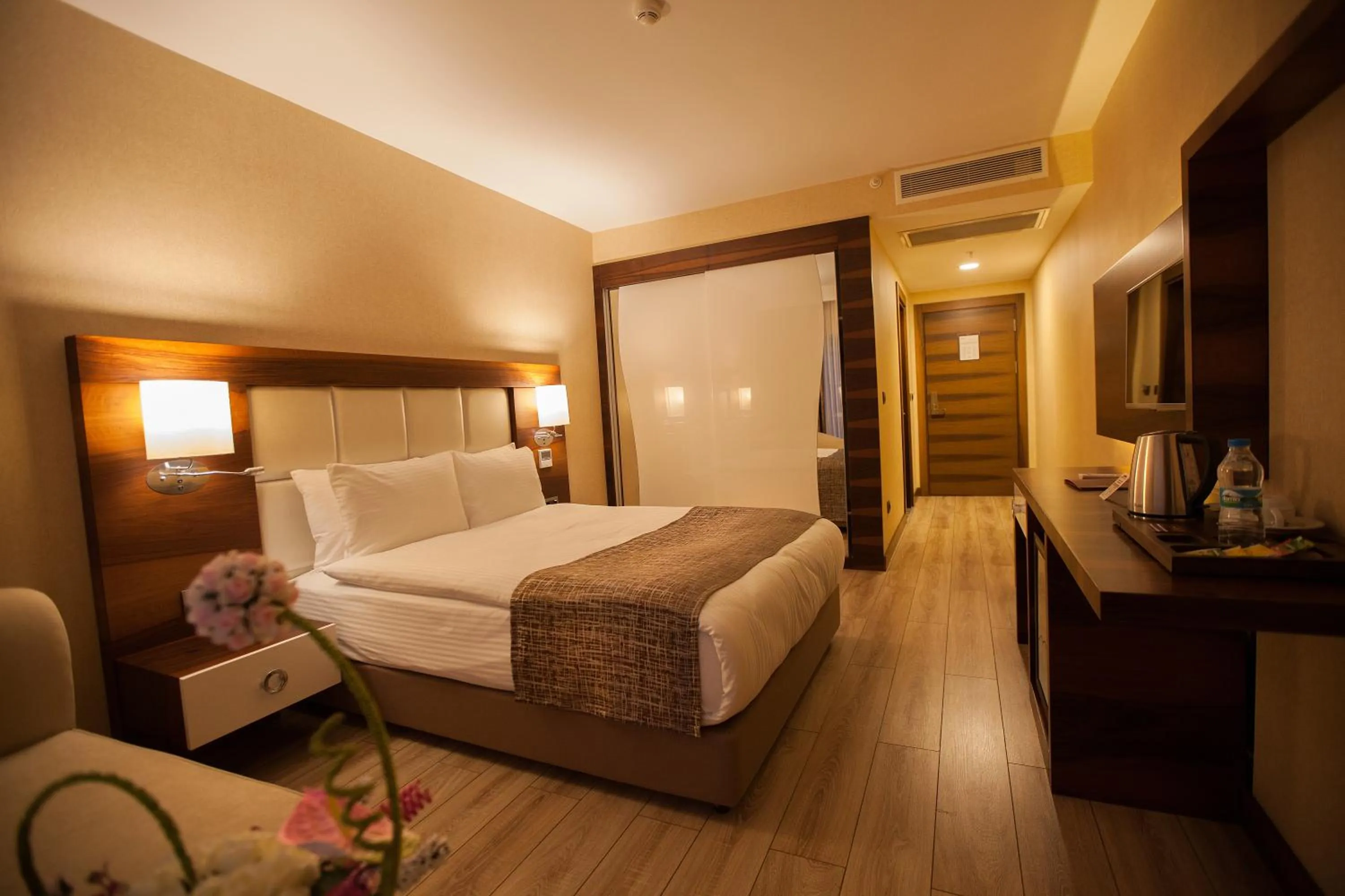 Bedroom in Mitannia Regency Hotel