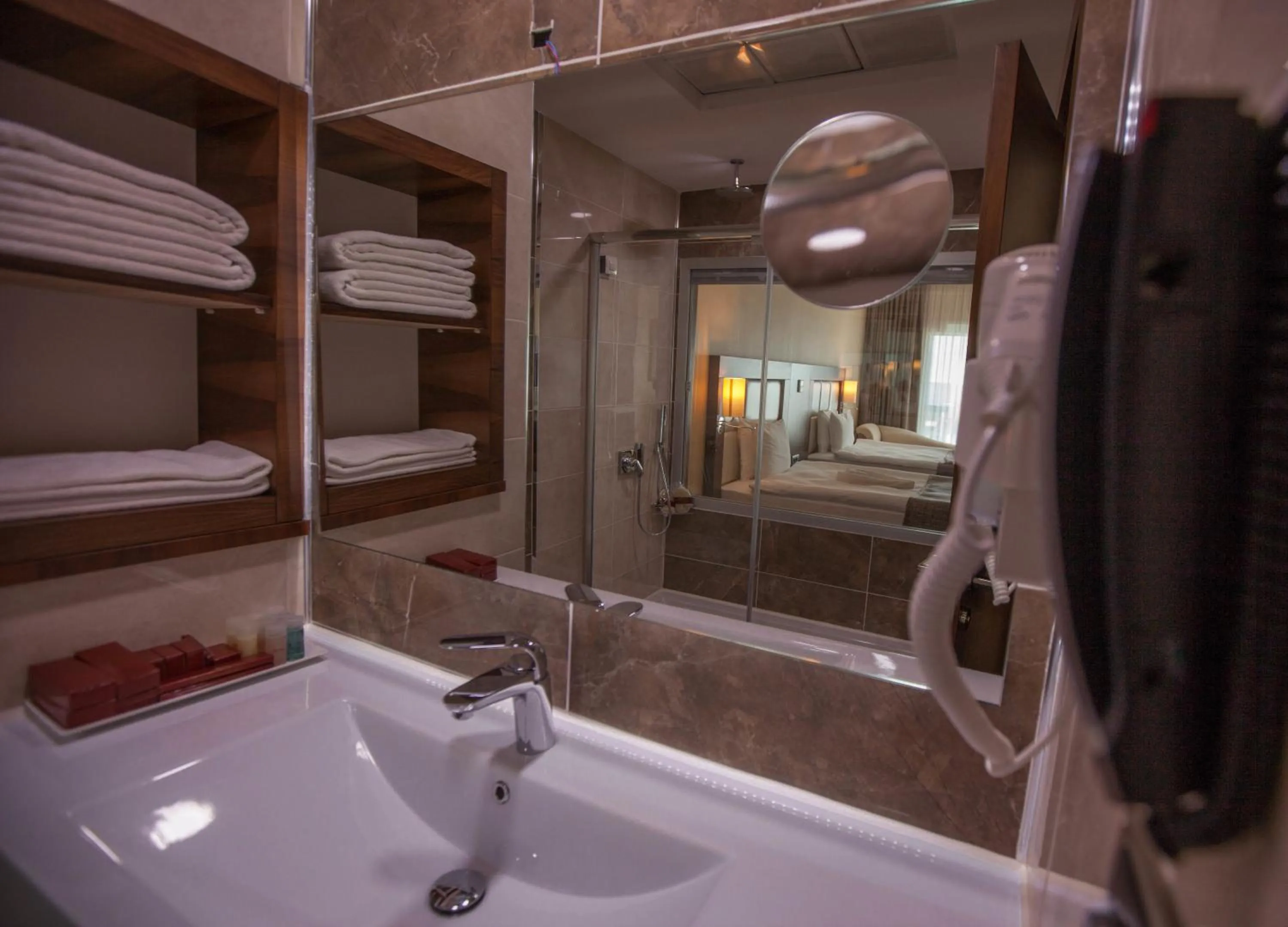 Bathroom in Mitannia Regency Hotel