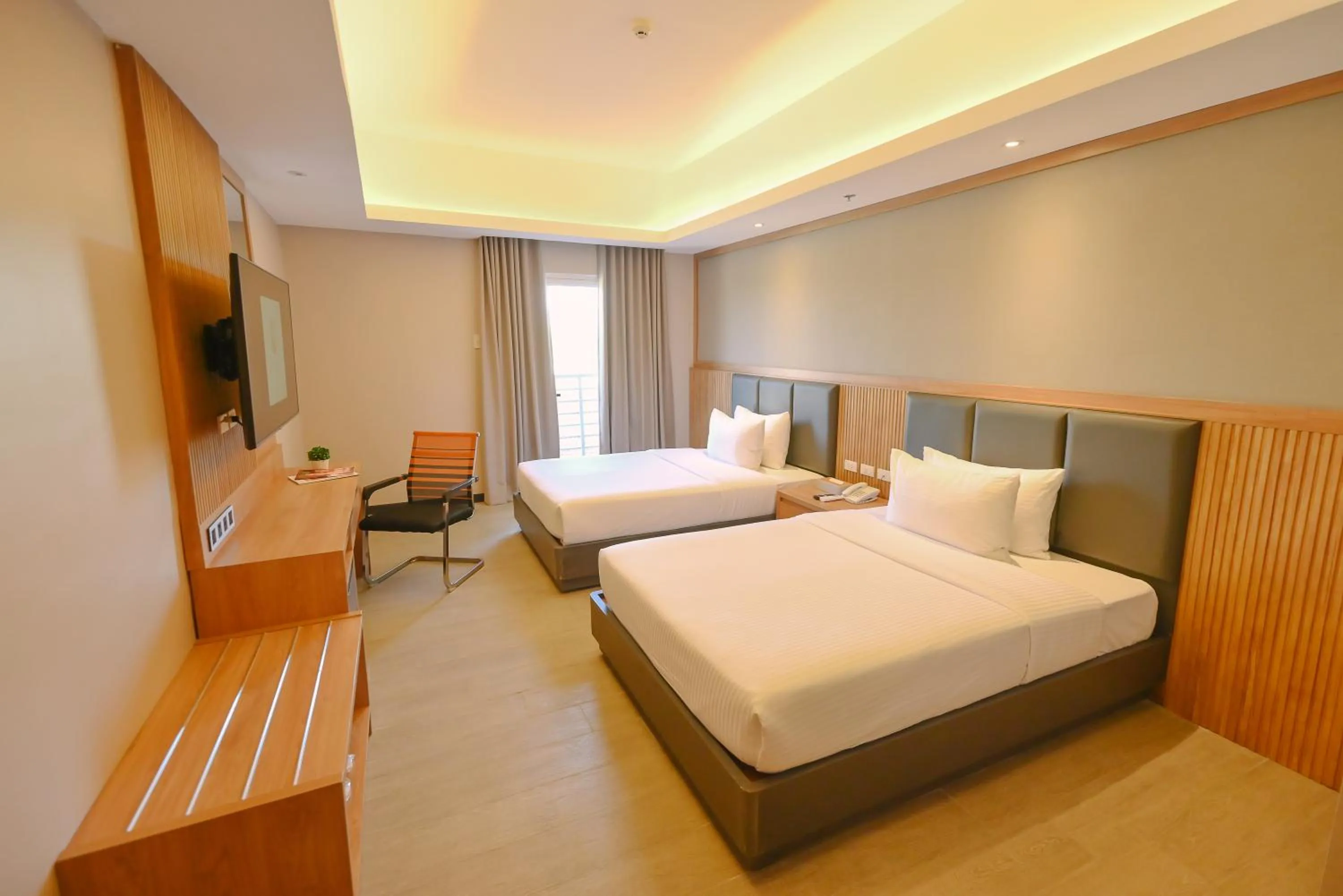 Bed in Sotogrande Hotel and Convention Center Batangas