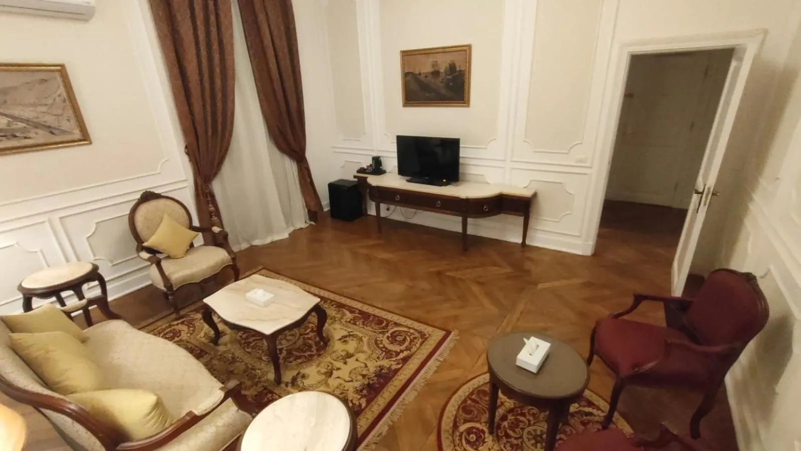 Communal lounge/ TV room in Maison Maxim De Lesseps