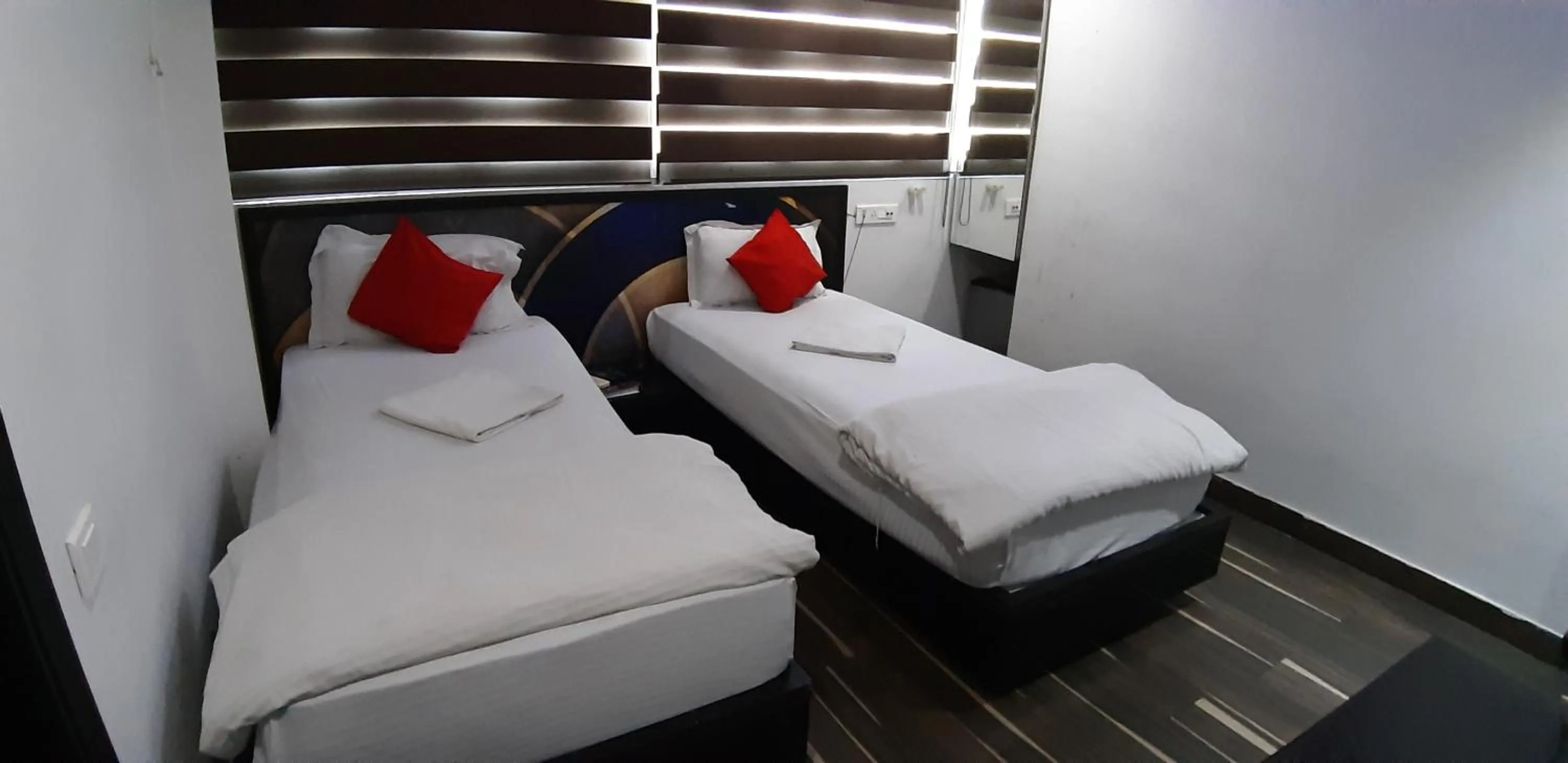 Bed in Hiland Inn The Boutique Hotel