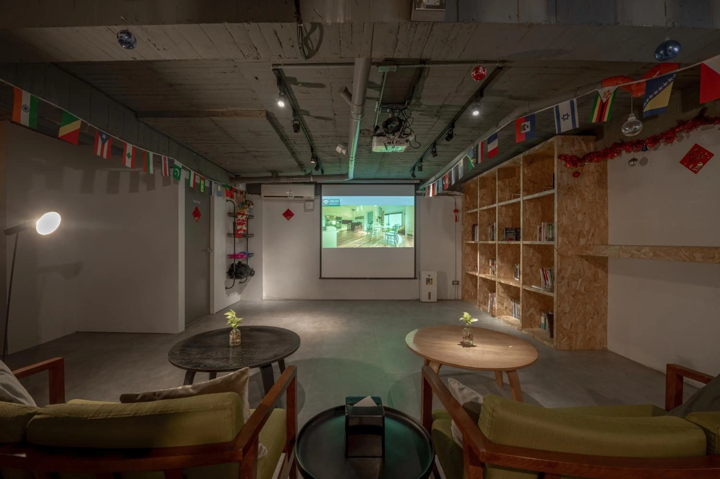 Communal lounge/ TV room in Light Hostel