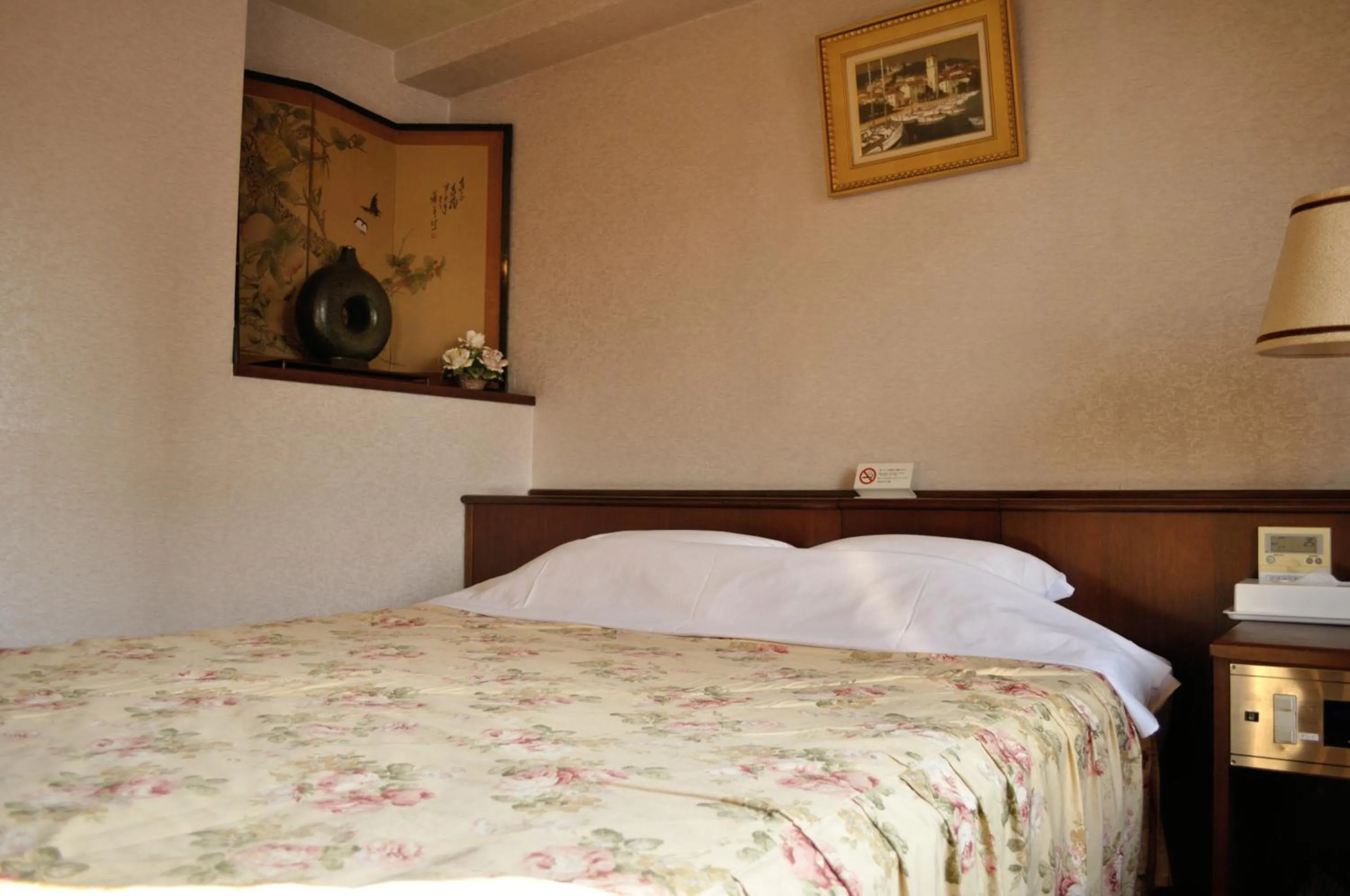 Bed in Hotel Los Inn Kochi