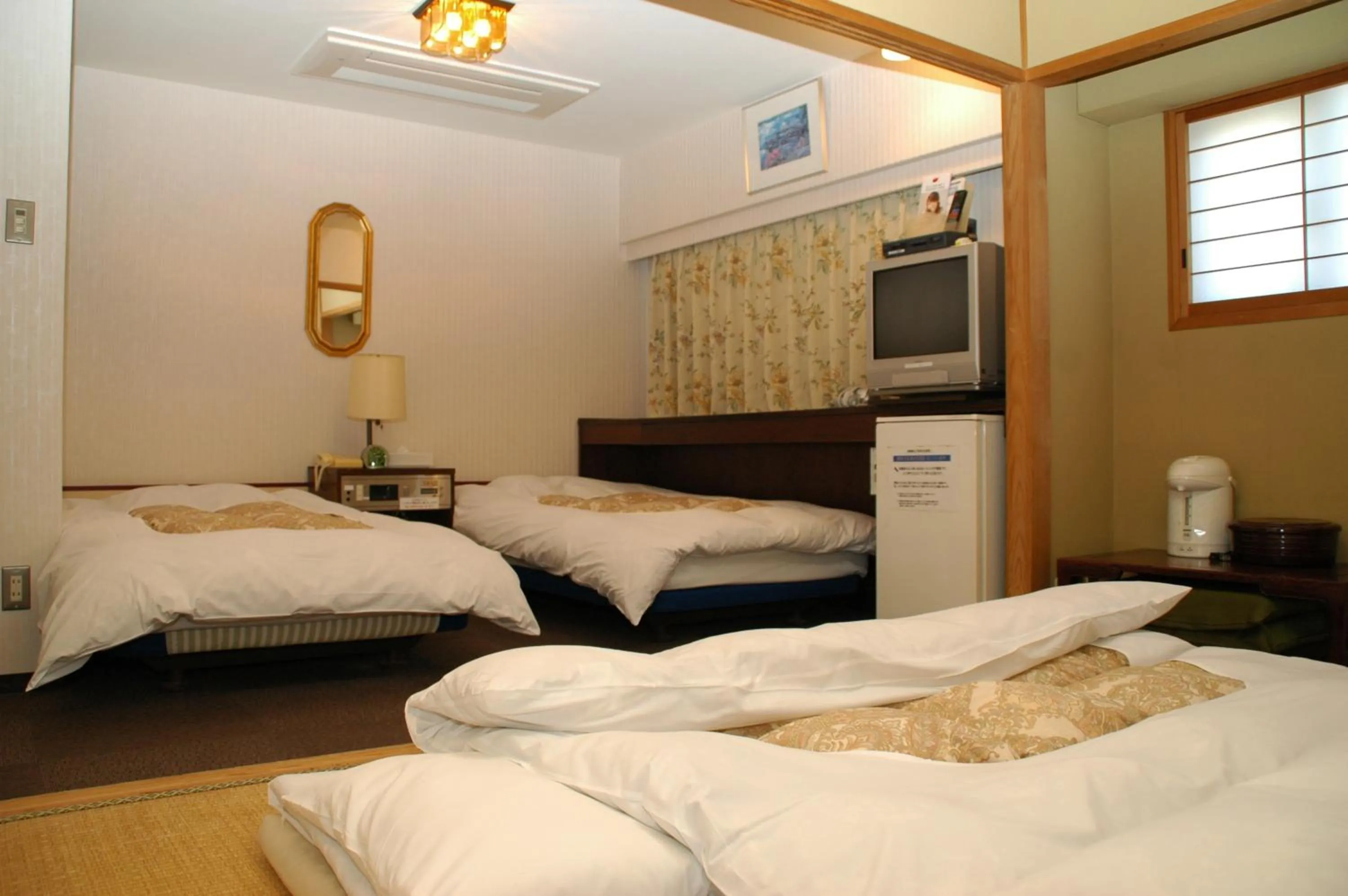 Bed in Hotel Los Inn Kochi