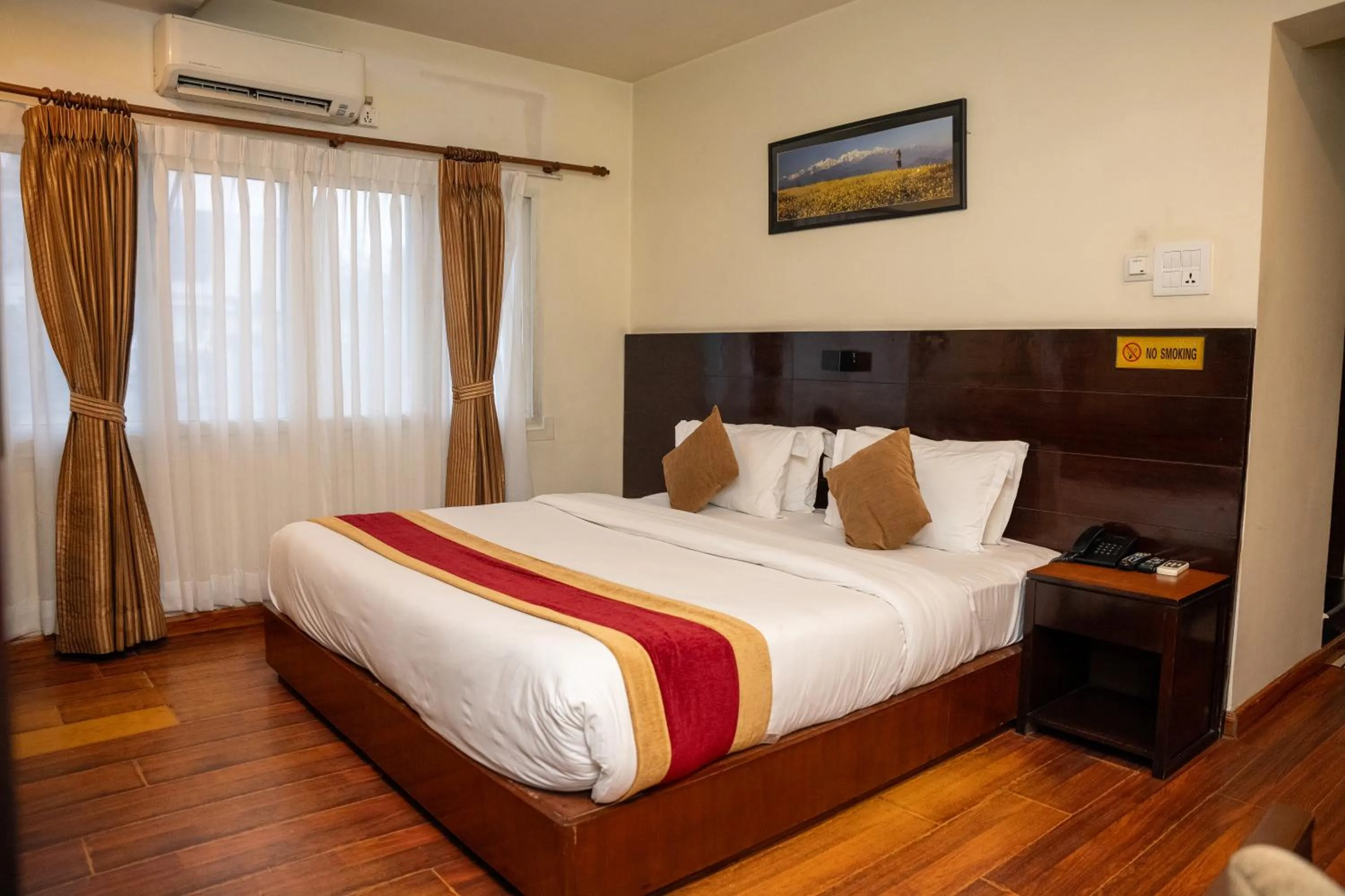 Bed in Aryatara Kathmandu Hotel