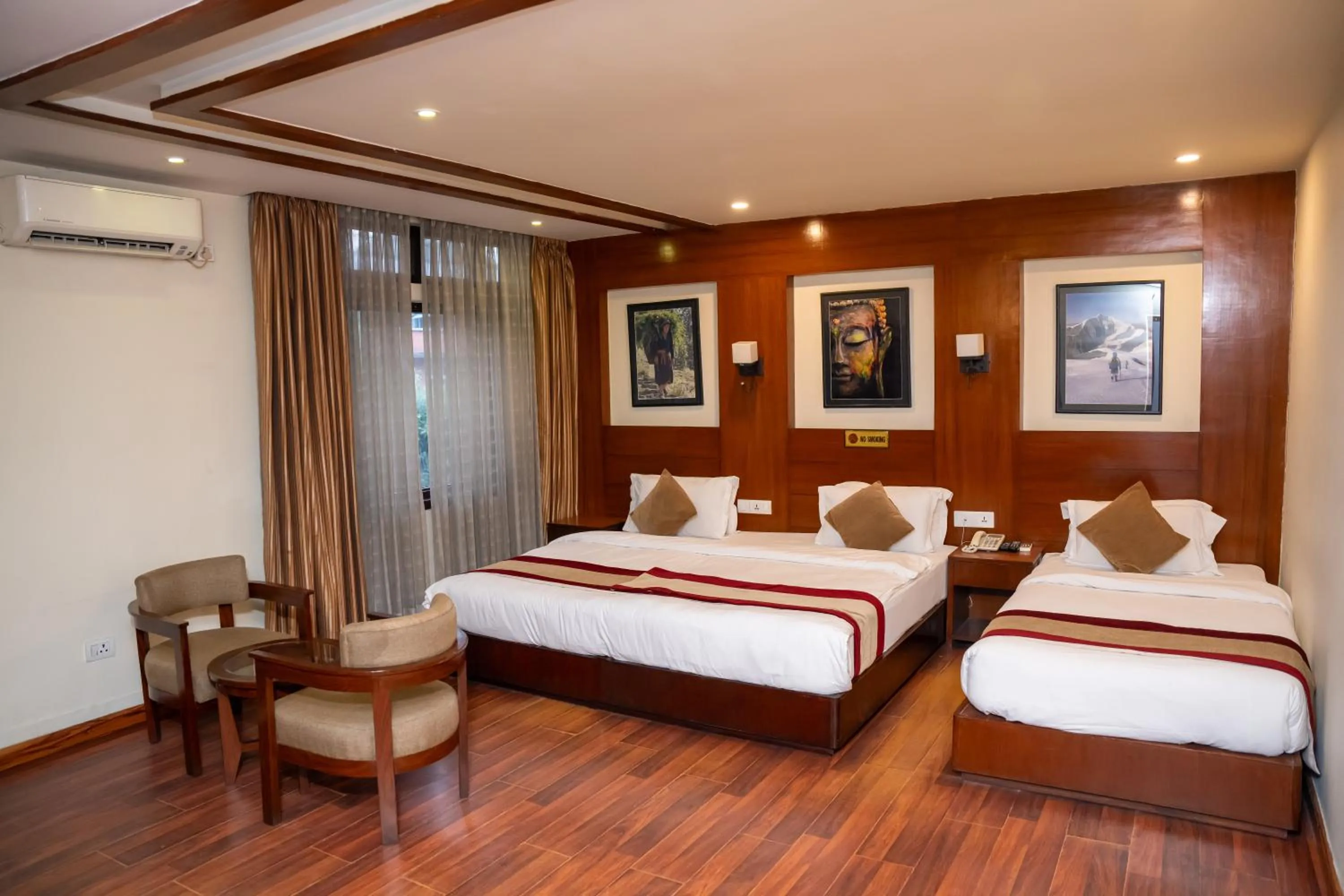 Bed in Aryatara Kathmandu Hotel