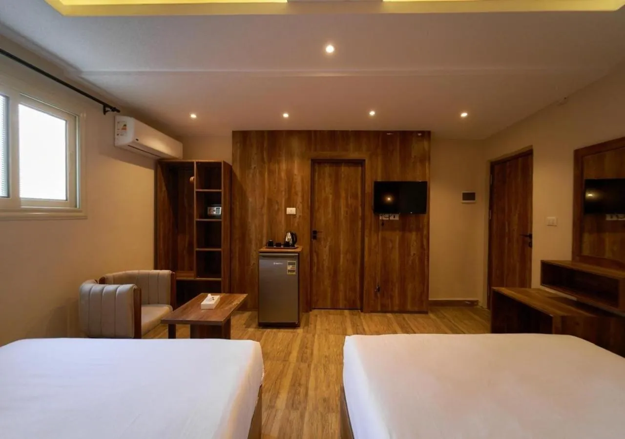 Bed in Crown Pyramids View Hotel