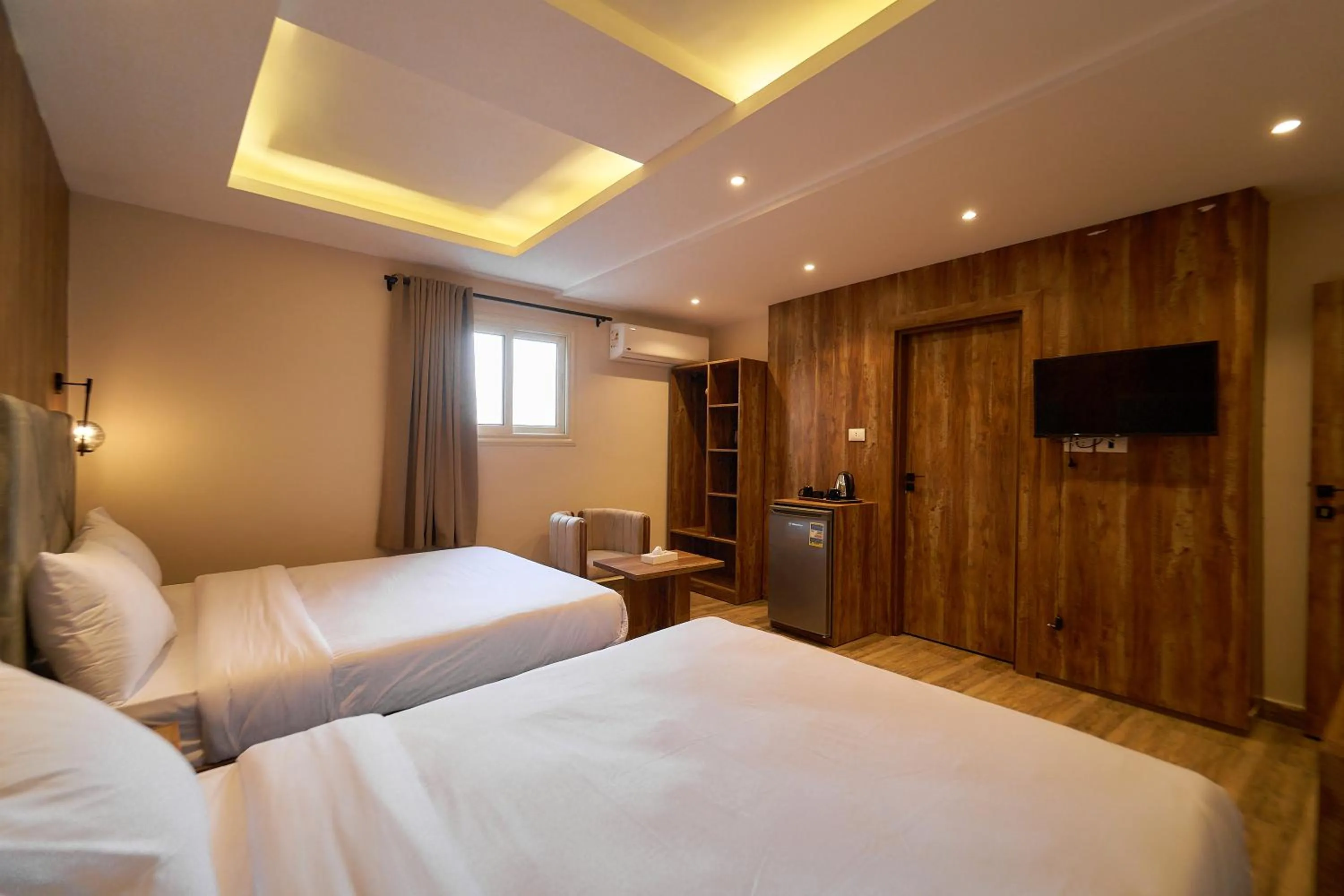 Bed in Crown Pyramids View Hotel