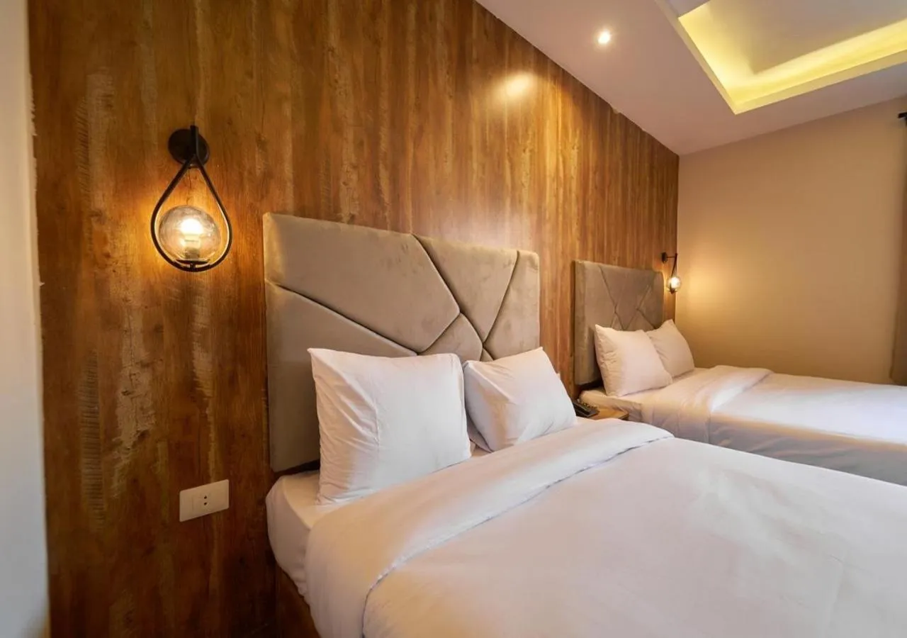 Bed in Crown Pyramids View Hotel