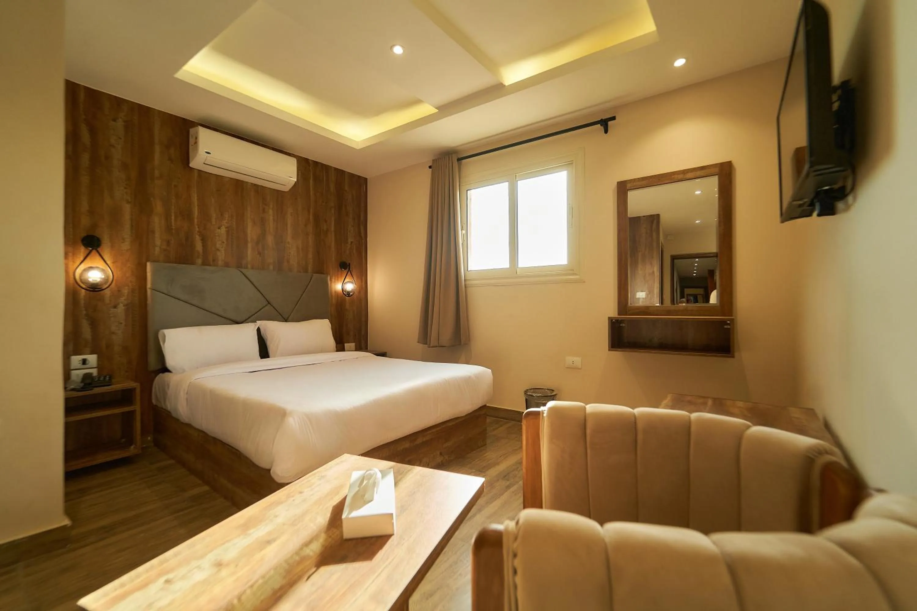 Bed in Crown Pyramids View Hotel