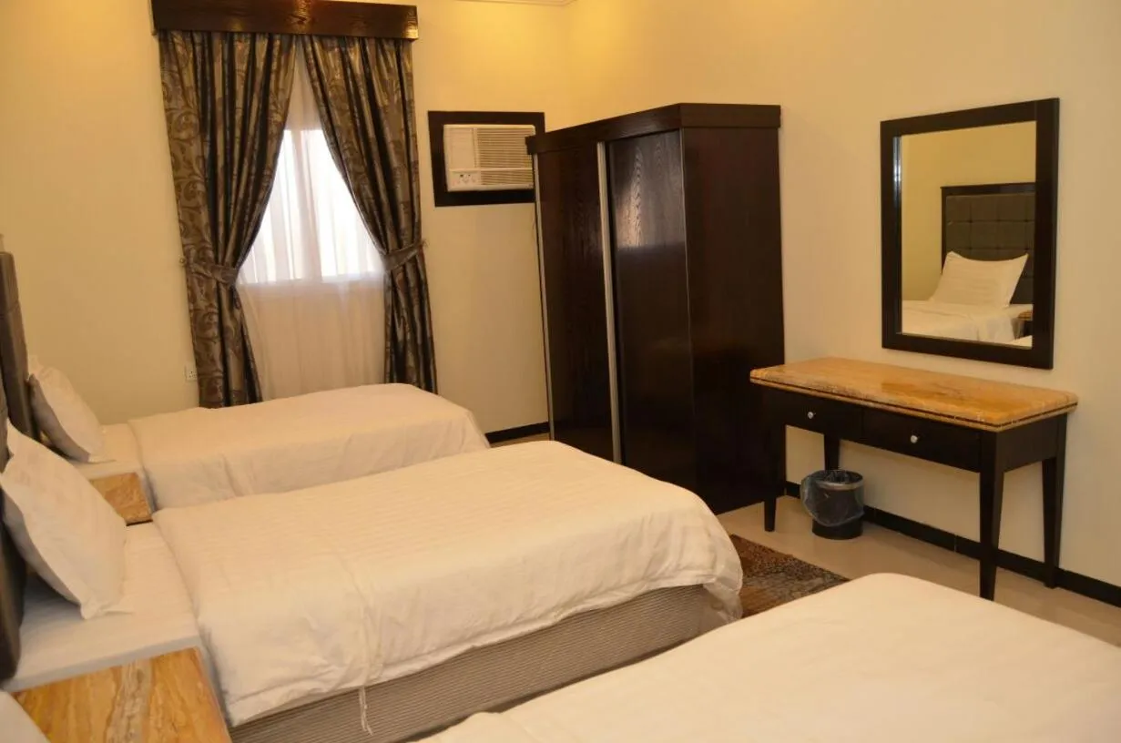 Bed in فخامة الديار للشقق المخدومة Fakhamat Aldyar For Serviced Apartments